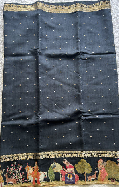 Pure Moonga Tussar Silk Saree Black Color Complemented with a Digital Print Border.