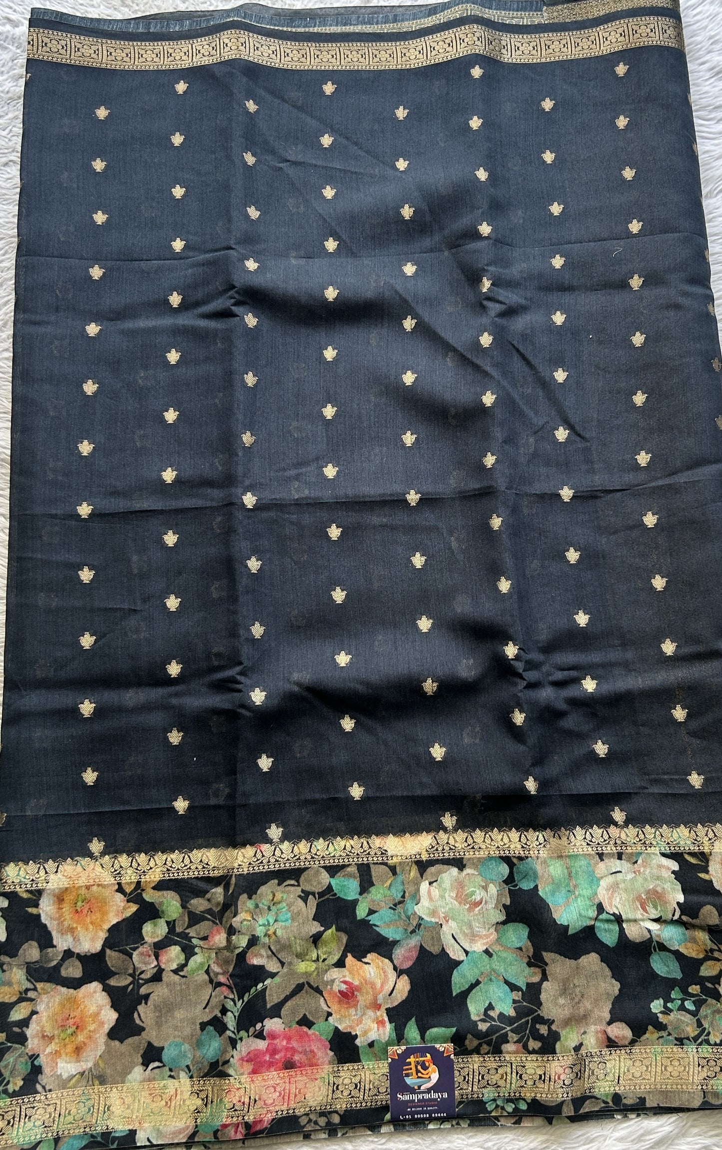 Pure Moonga Tussar Silk Saree Black Color Complemented with a Digital Print Border.