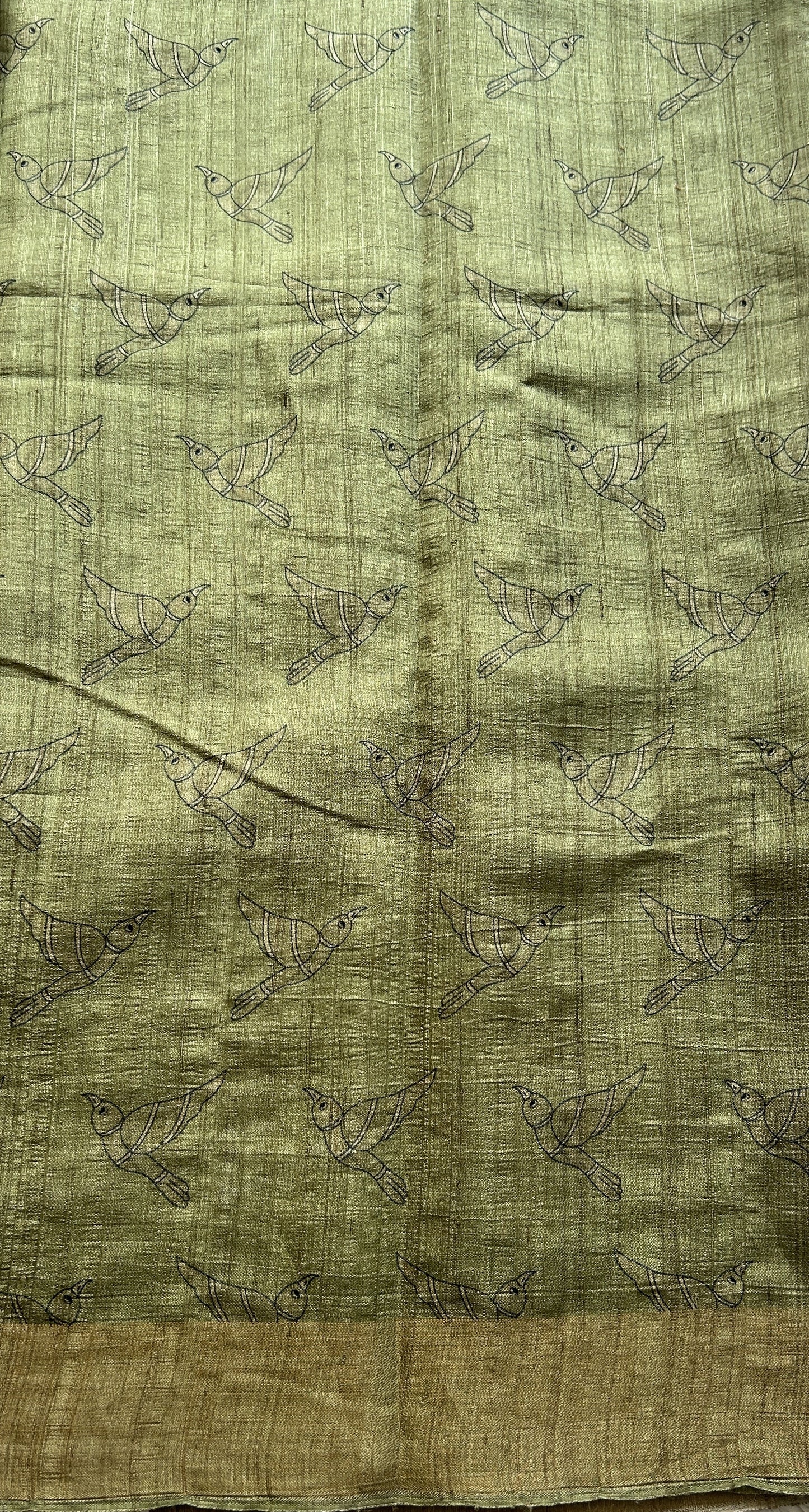 Pure Tussar Silk Saree Olive Green Color Complemented with a Zari Border.