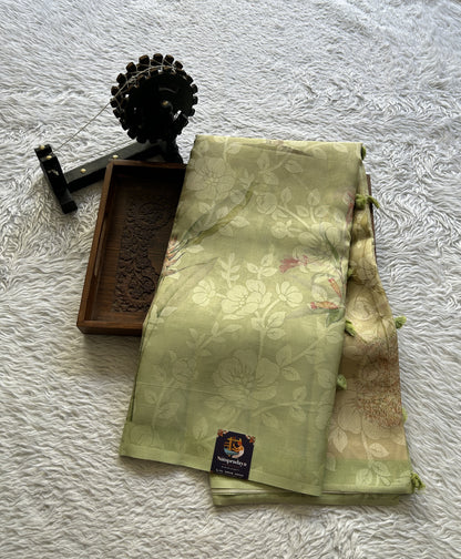 Banarasi Tissue Fancy Saree Light Green Colored Complemented with a Borderless.