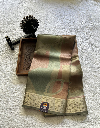 Banarasi Tissue Fancy Saree Light Green Colored Paired with a Zari Border.