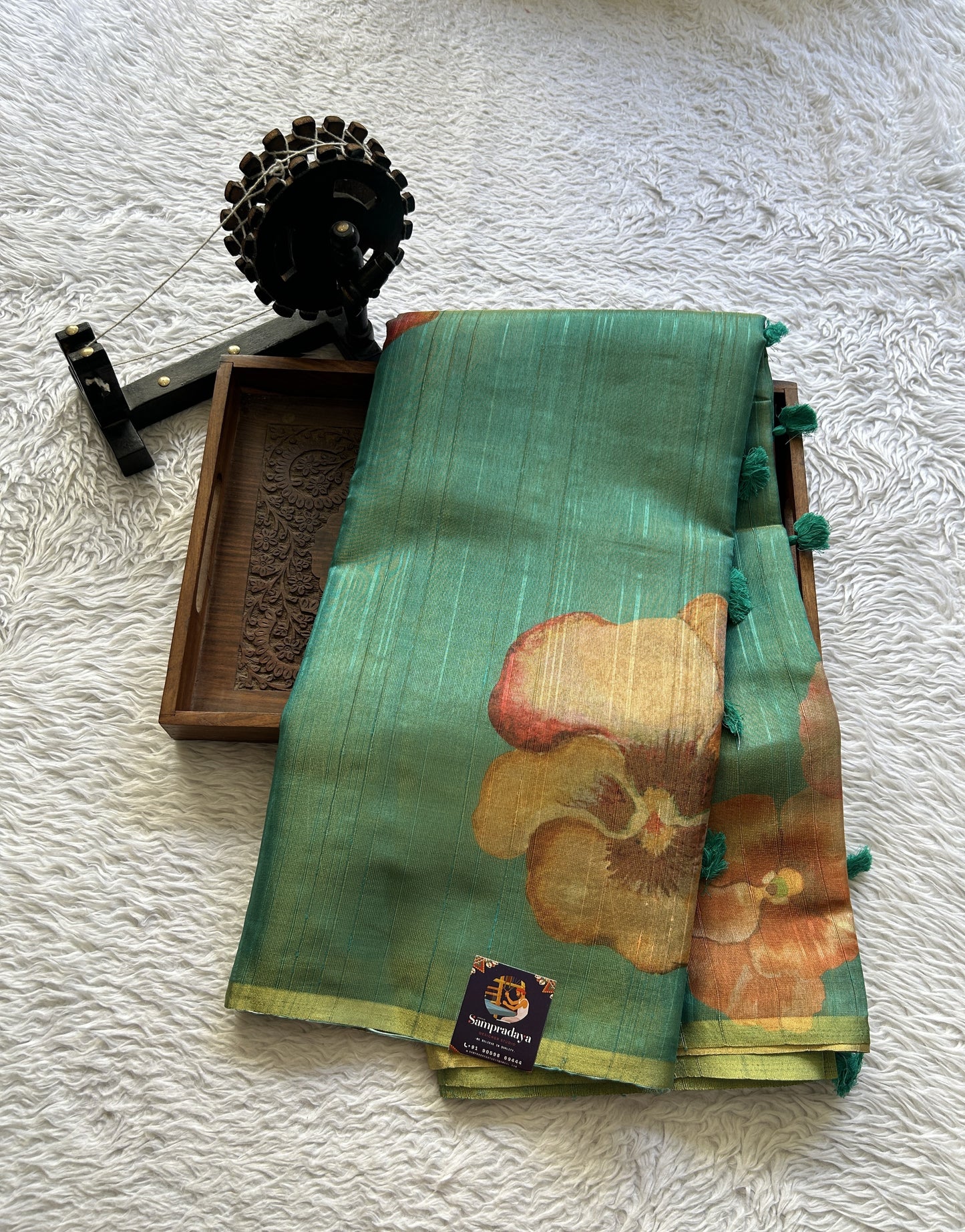 Banarasi Tissue Fancy Saree Rama Green Colored Paired with a Borderless.