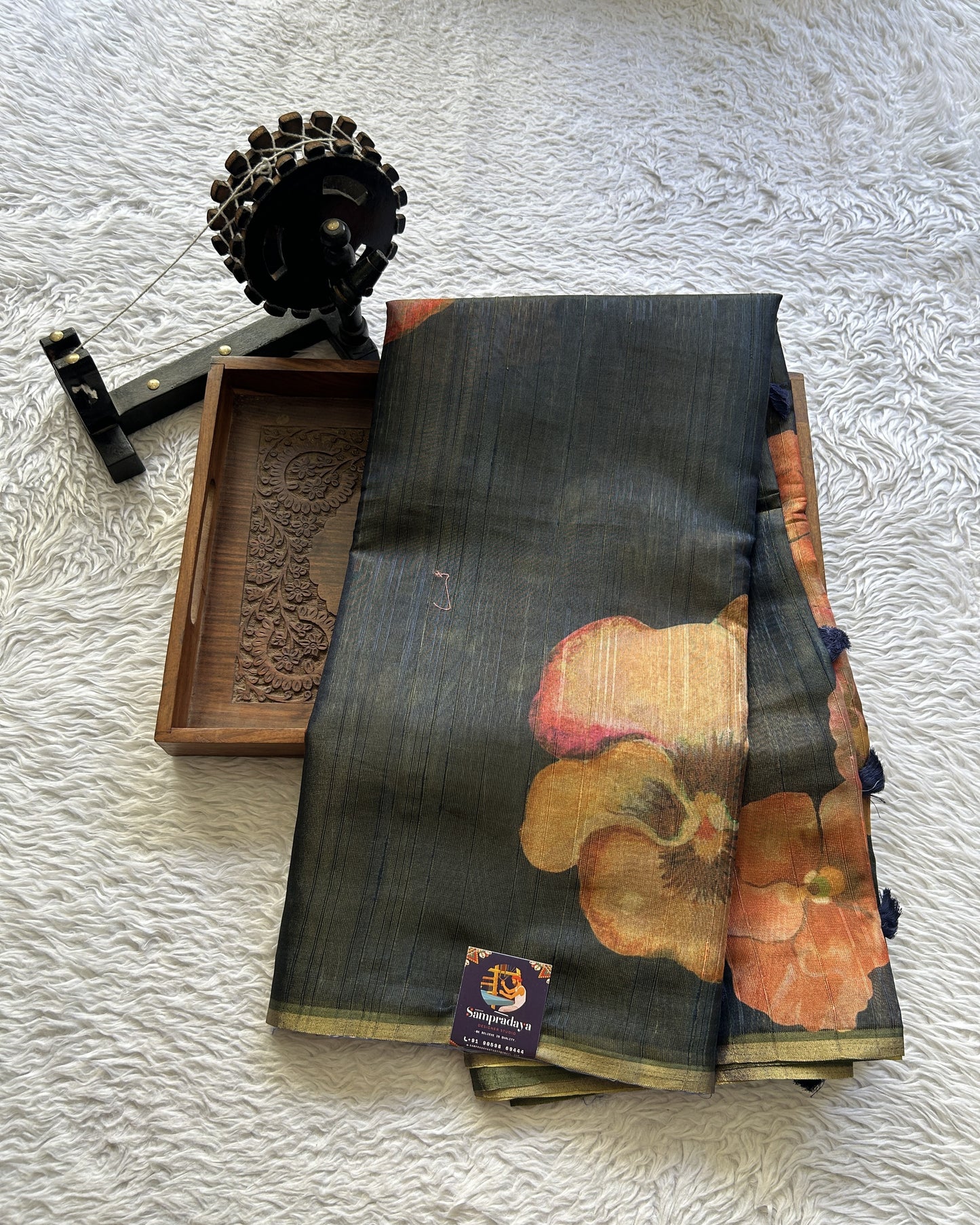 Banarasi Tissue Fancy Saree Navy Blue Colored Paired with a Borderless.