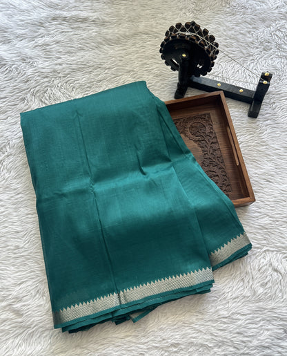 Mangalagiri Plain Pattu Saree Bottle Green colored complemented with a Zari Border - Sampradaya Designer Studio