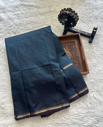 Mangalagiri Plain Pattu Saree Peacock Green colored complemented with a Mangalagiri Gap Border - Sampradaya Designer Studio