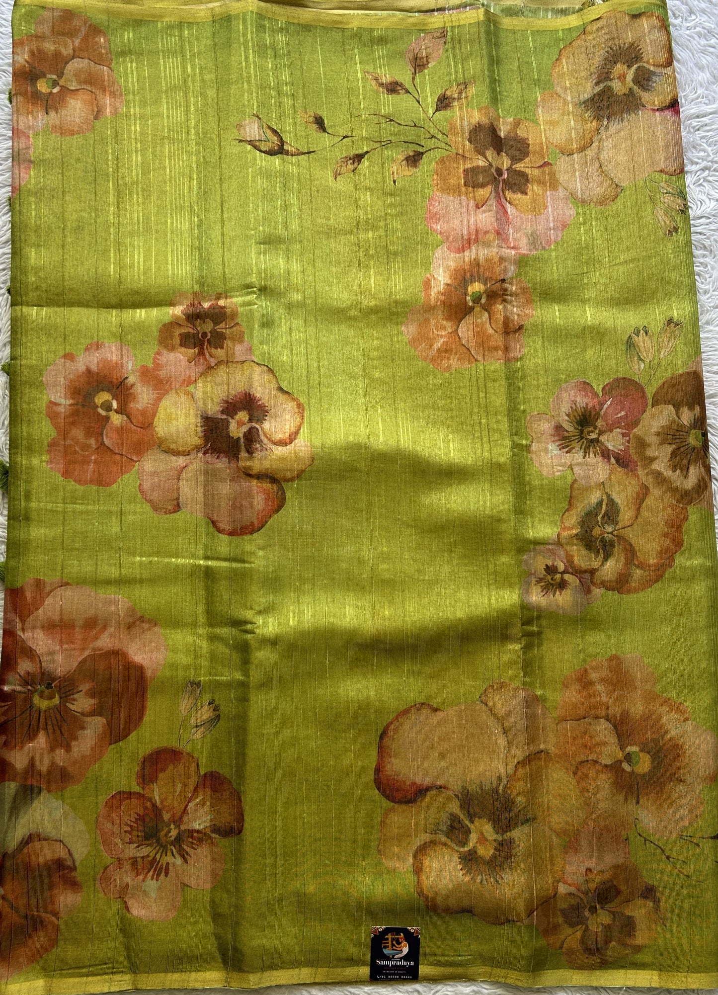 Banarasi Tissue Fancy Saree Parrot Green Colored Paired with a Borderless.