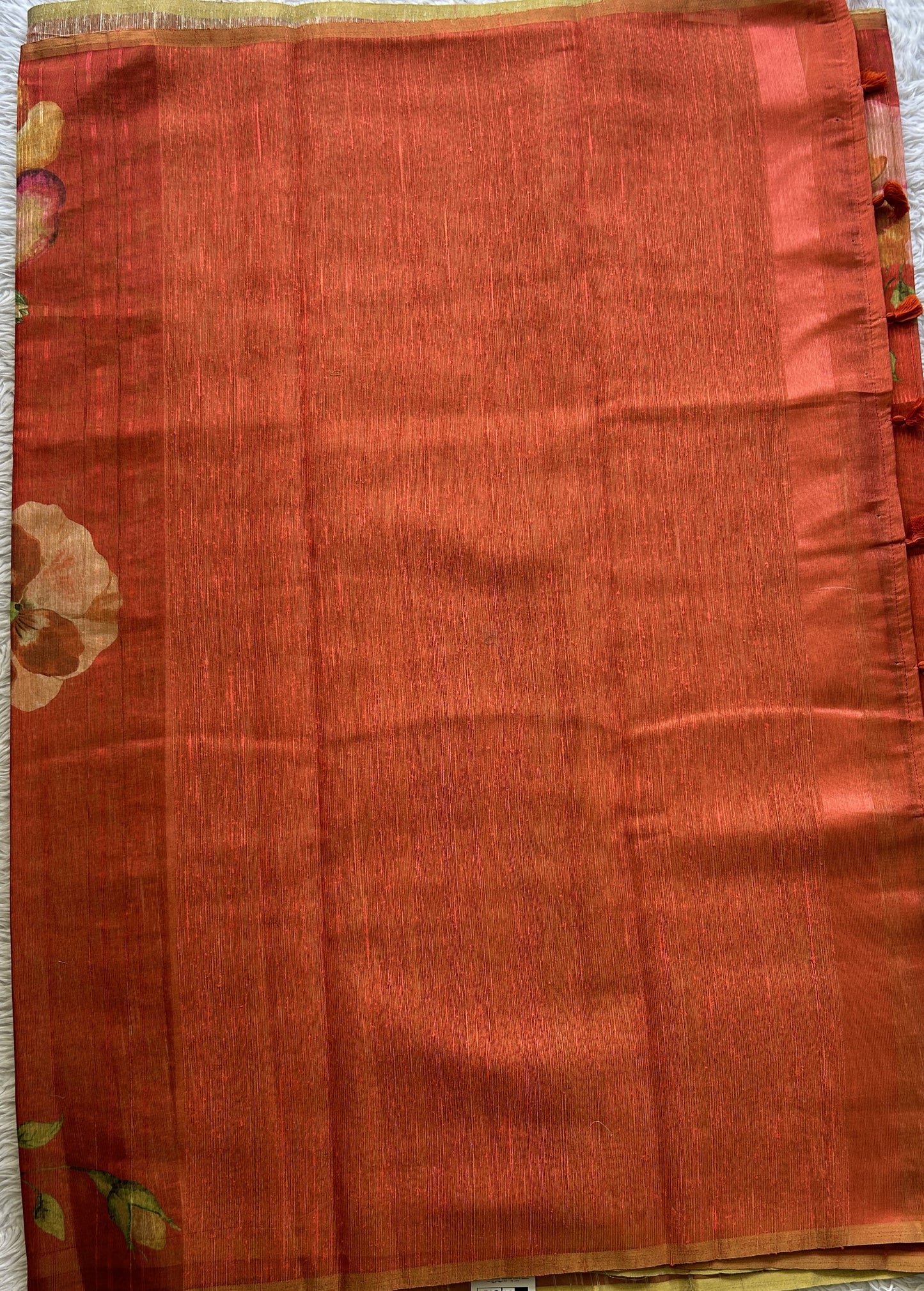 Banarasi Tissue Fancy Saree Dark Orange Colored Paired with a Borderless.