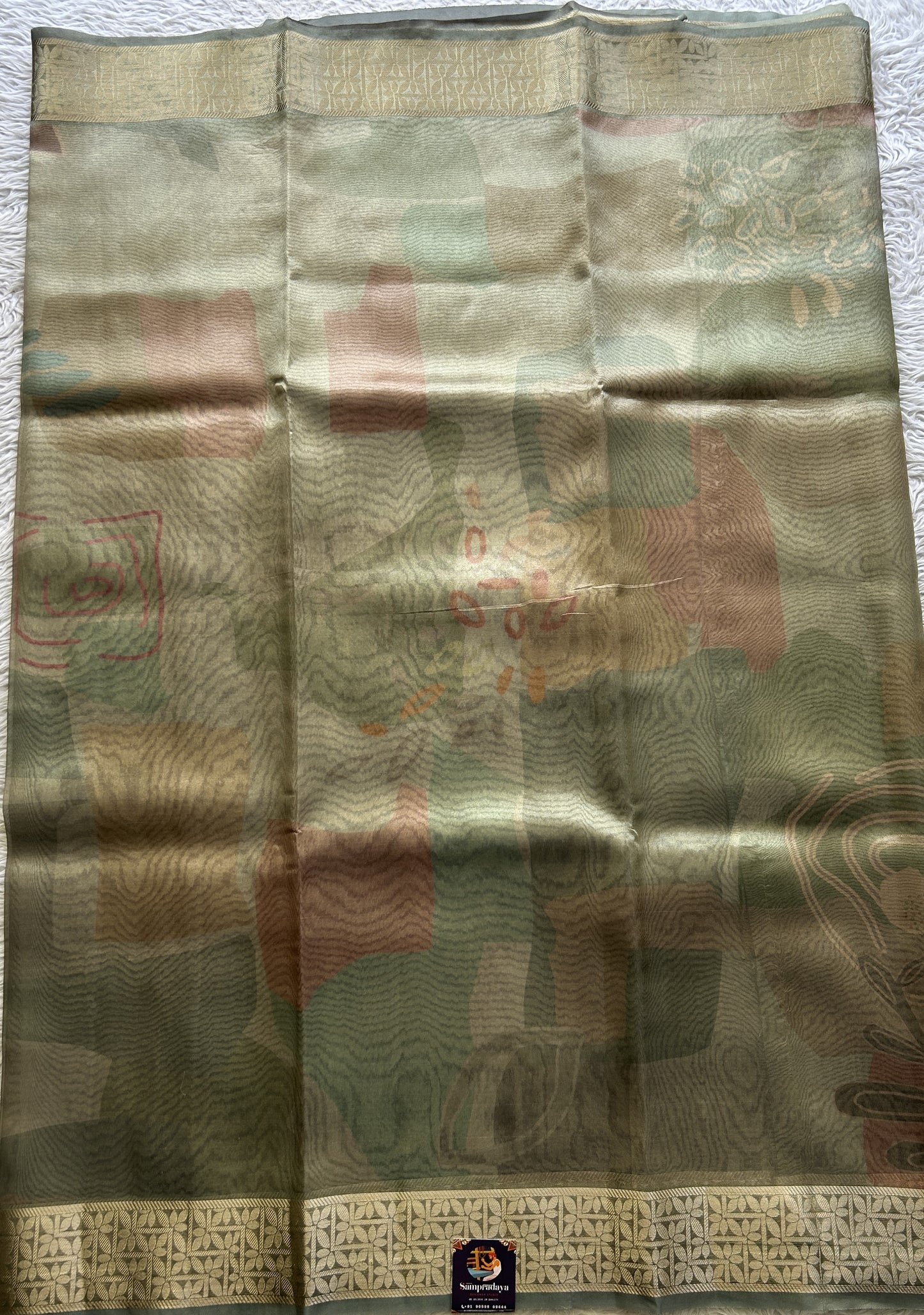 Banarasi Tissue Fancy Saree Sea Green Colored Complemented with a Zari Border.