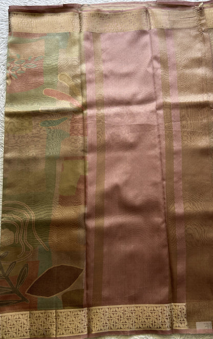 Banarasi Tissue Fancy Saree Onion Pink Colored Complemented with a Zari Border.