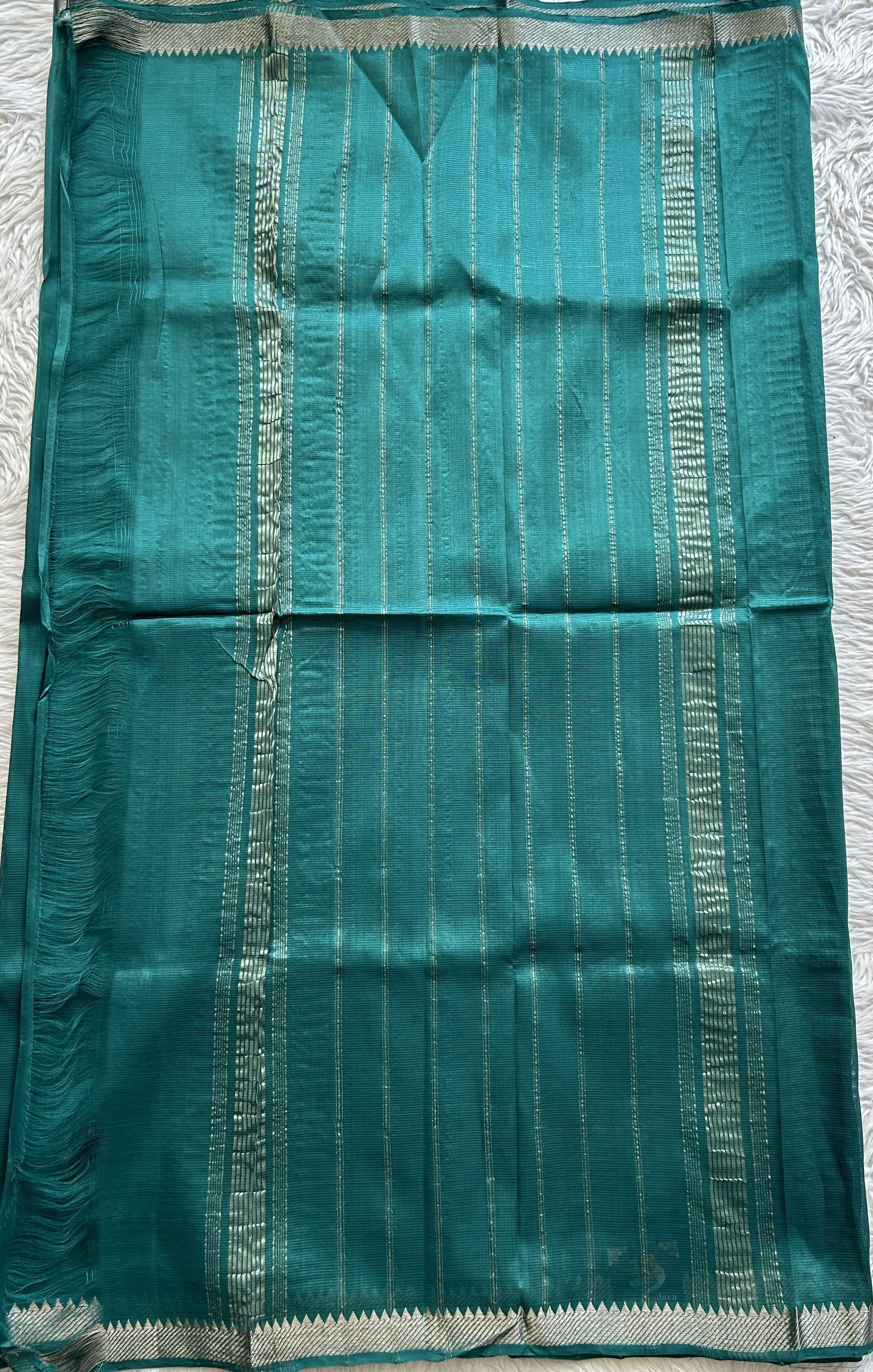 Mangalagiri Plain Pattu Saree Bottle Green colored complemented with a Zari Border - Sampradaya Designer Studio