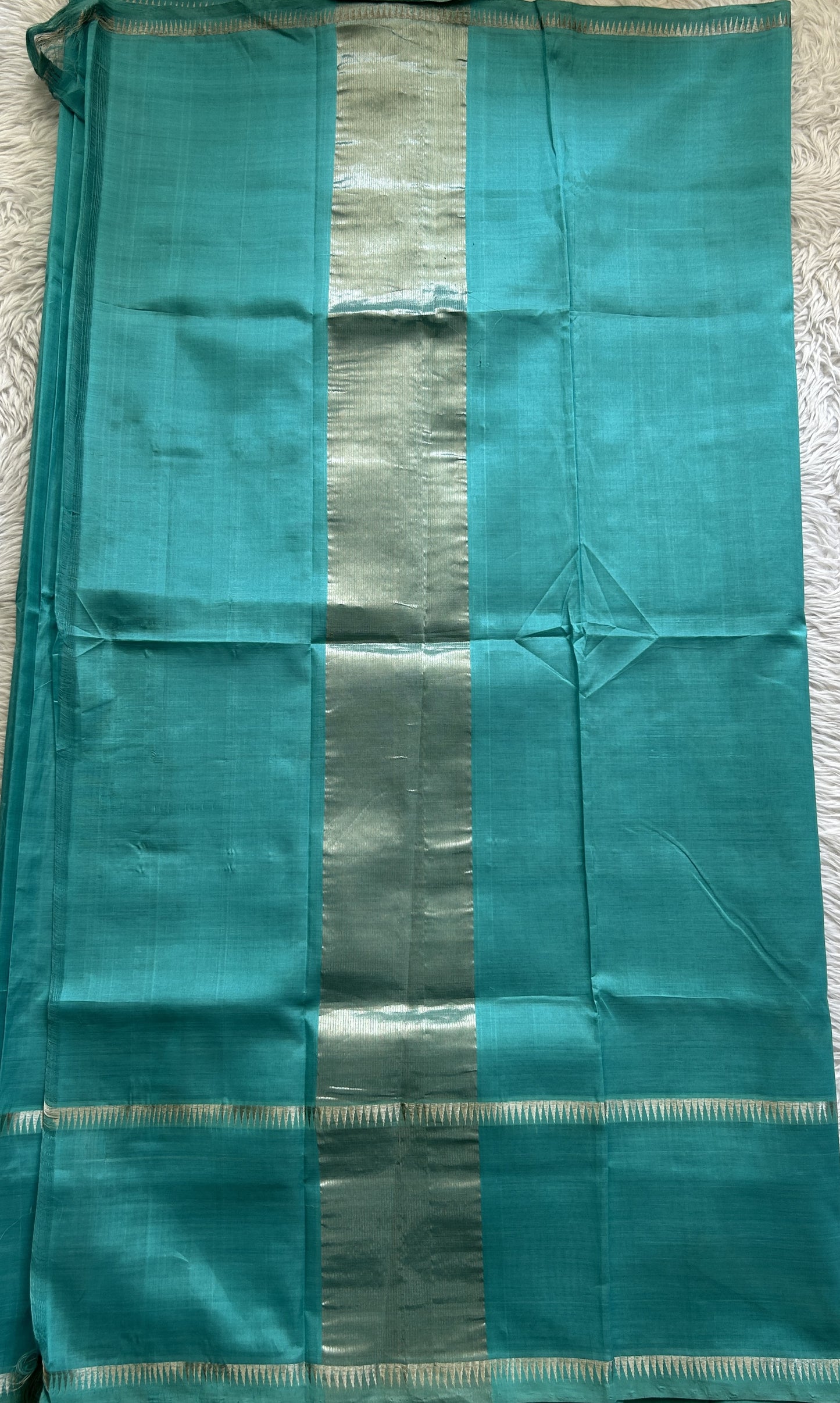 Mangalagiri Plain Pattu Saree Aqua Blue colored complemented with a mangalagiri Gap Border - Sampradaya Designer Studio