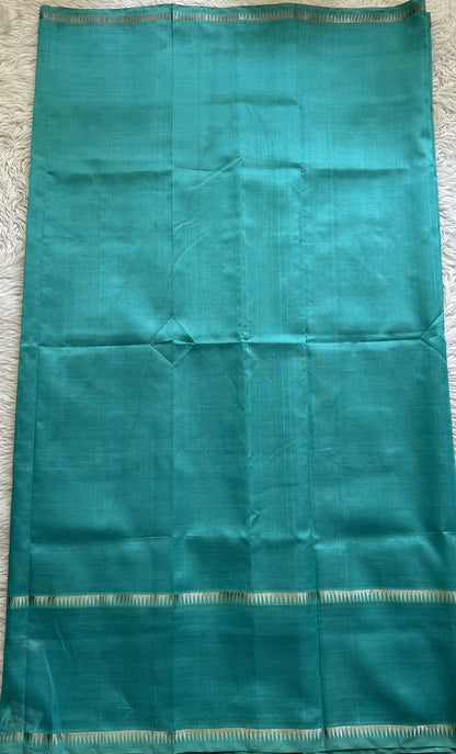 Mangalagiri Plain Pattu Saree Aqua Blue colored complemented with a mangalagiri Gap Border - Sampradaya Designer Studio