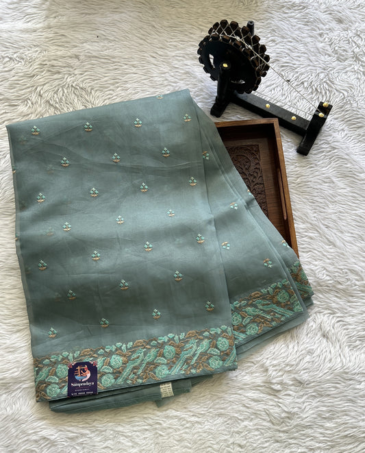 Banarasi Fancy Saree Aqua Blue Colored Complemented with a Zari Border. - Sampradaya Designer Studio