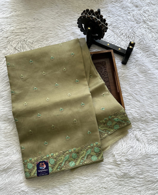 Banarasi Fancy Saree Light Olive Green Colored Complemented with a Zari Border. - Sampradaya Designer Studio