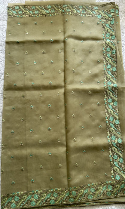 Banarasi Fancy Saree Light Olive Green Colored Complemented with a Zari Border. - Sampradaya Designer Studio