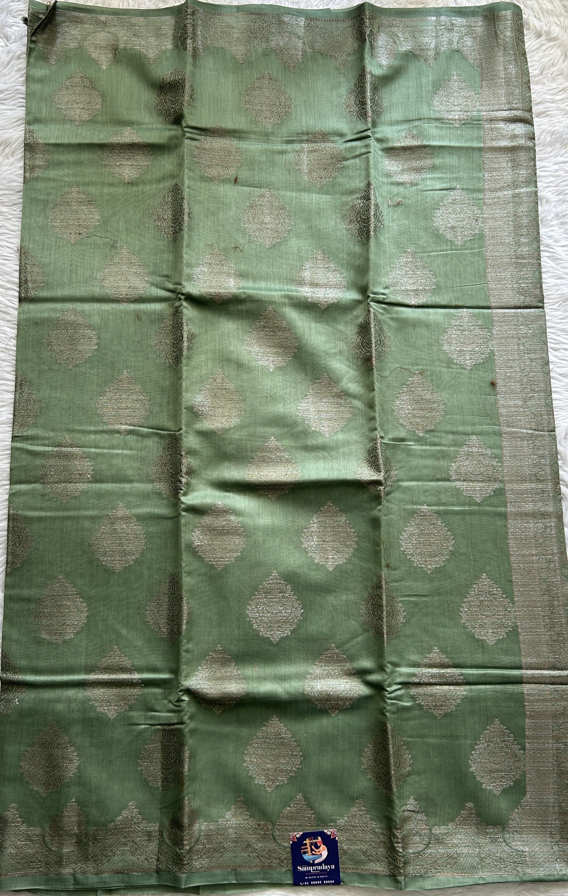 Maheshwari Chanderi Cotton Saree Olive Green Colored Complemented with a Zari Border. - Sampradaya Designer Studio