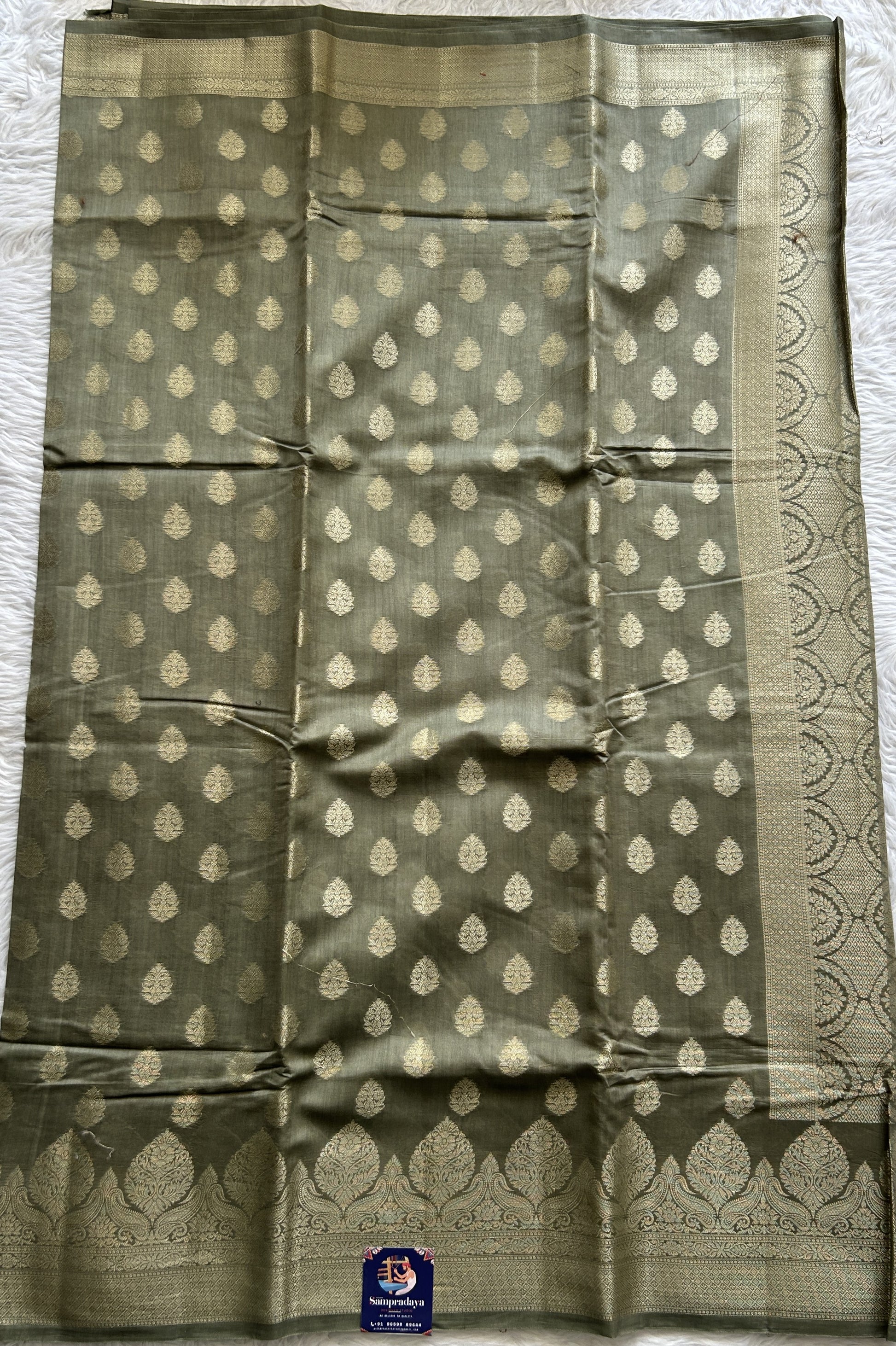 Maheshwari Chanderi Cotton Saree Dark Olive Green Colored Complemented with a Zari Border. - Sampradaya Designer Studio