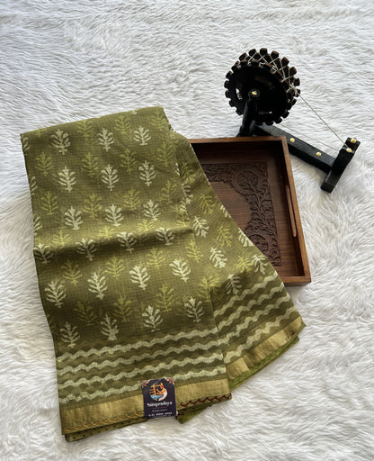 Cotton Kota Saree Olive Green Colored Complemented with a Zari Border. - Sampradaya Designer Studio