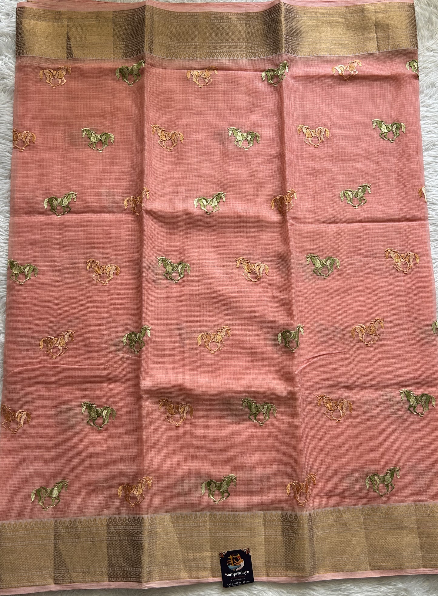 Cotton Kota Saree Peach Colored Complemented with a Zari Border. - Sampradaya Designer Studio