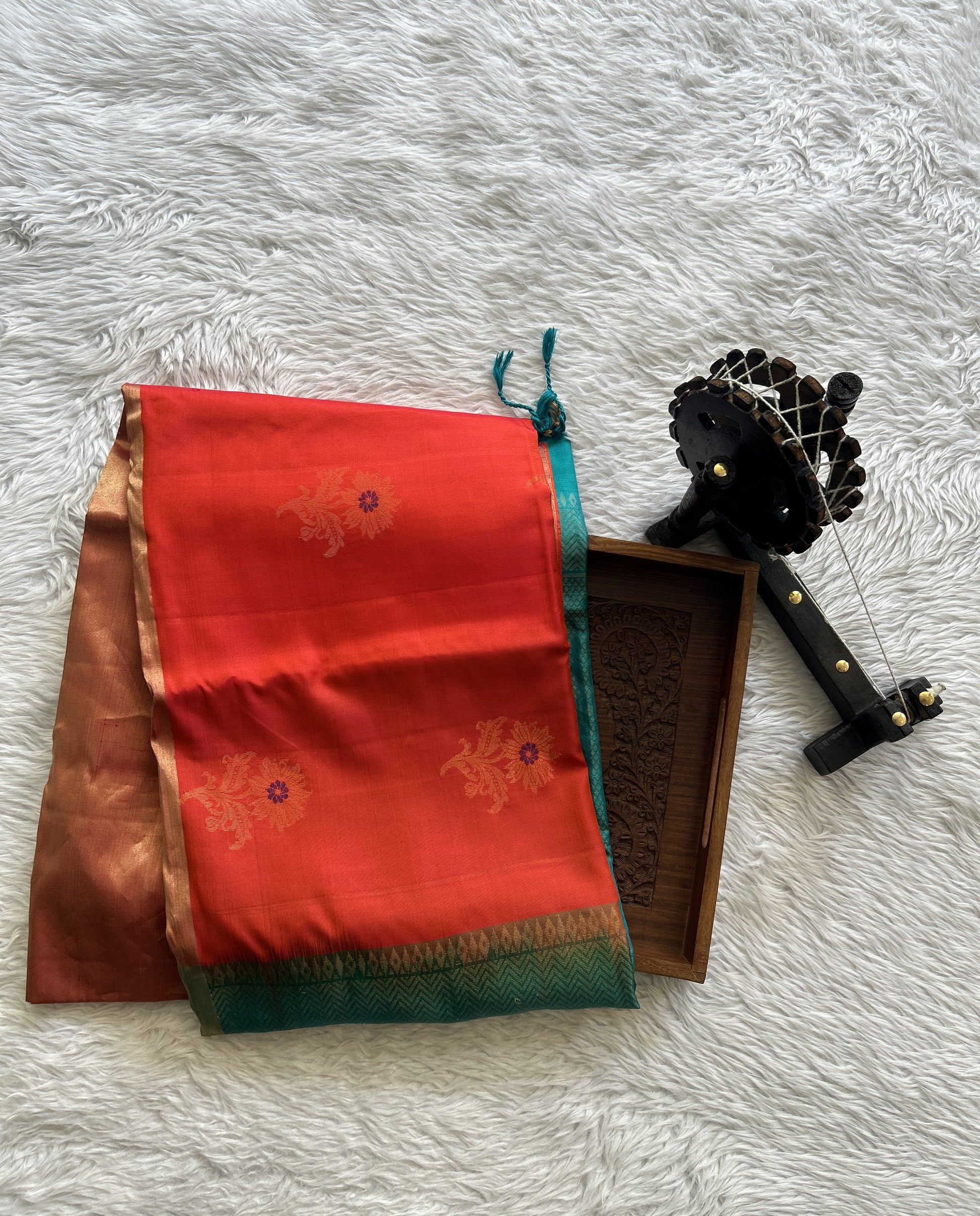 Pure Kanjivaram Soft Silk Saree Orange colored complemented with a Zari Border. - Sampradaya Designer Studio