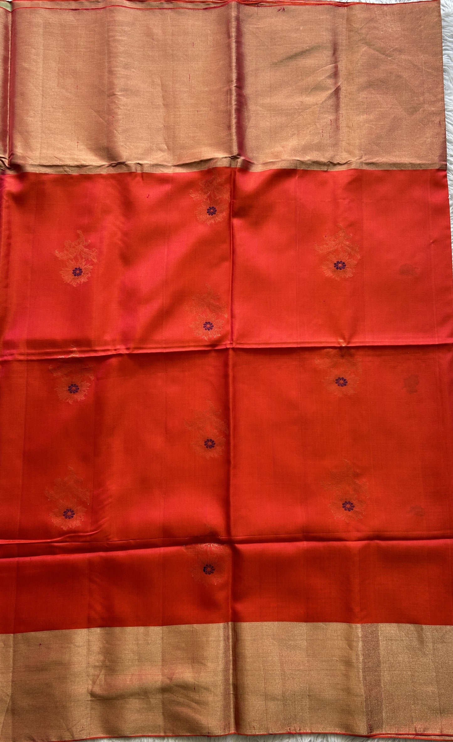 Pure Kanjivaram Soft Silk Saree Orange colored complemented with a Zari Border. - Sampradaya Designer Studio