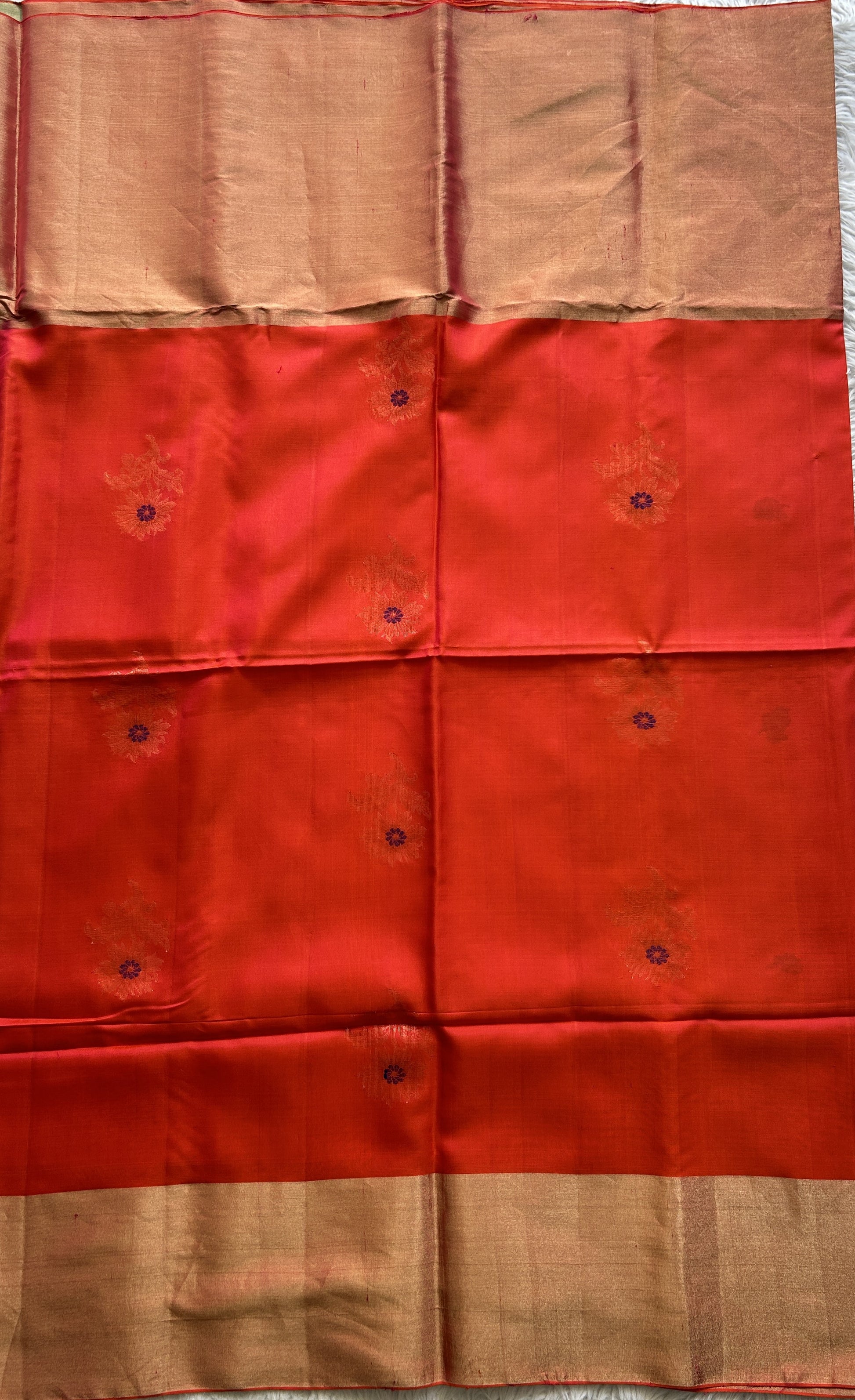 Pure Kanjivaram Soft Silk Saree Orange colored complemented with a Zari Border. - Sampradaya Designer Studio