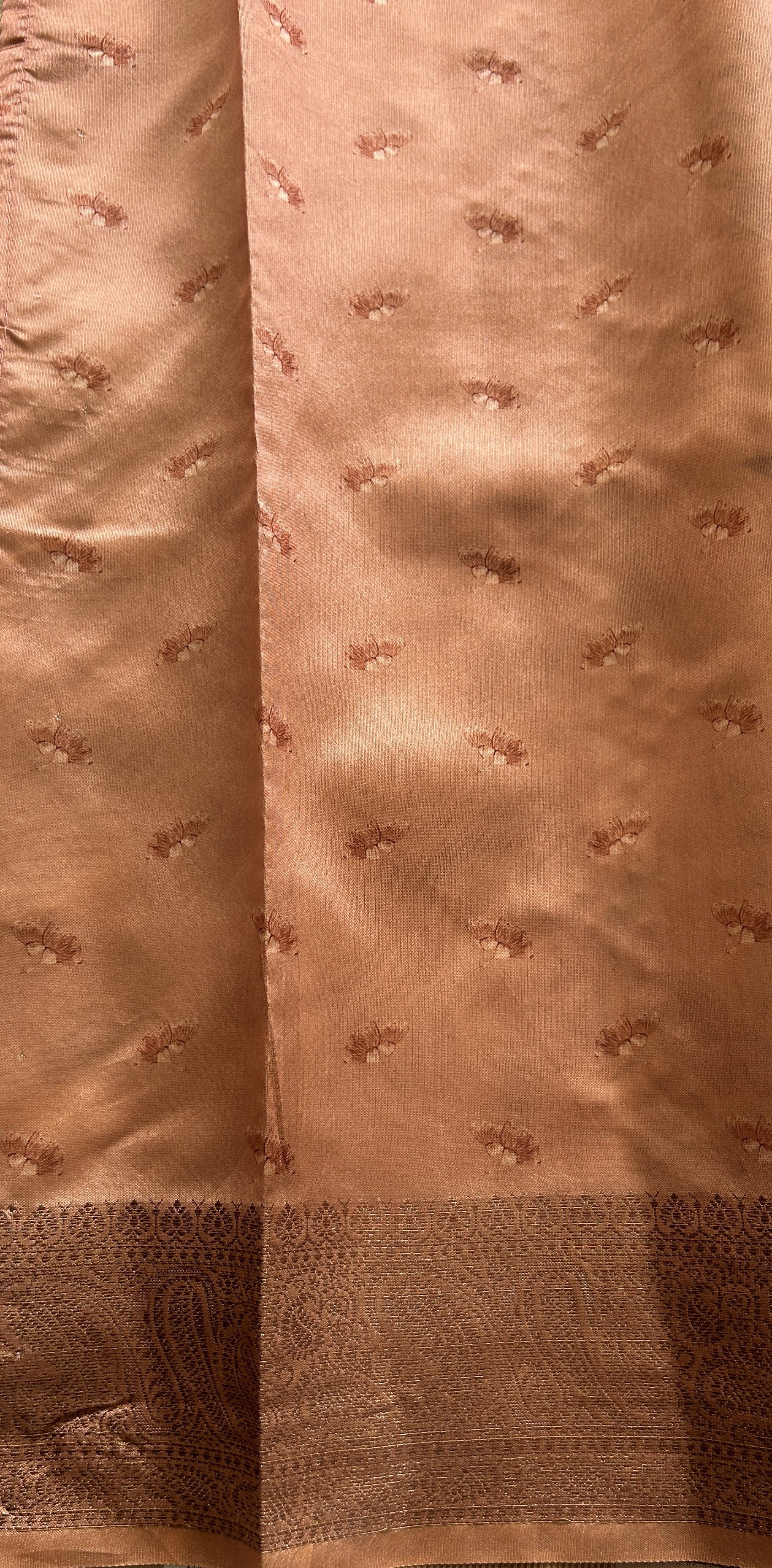 Semi Tussar Saree Cream colored complemented with a Pastel Orange Zari Border. - Sampradaya Designer Studio