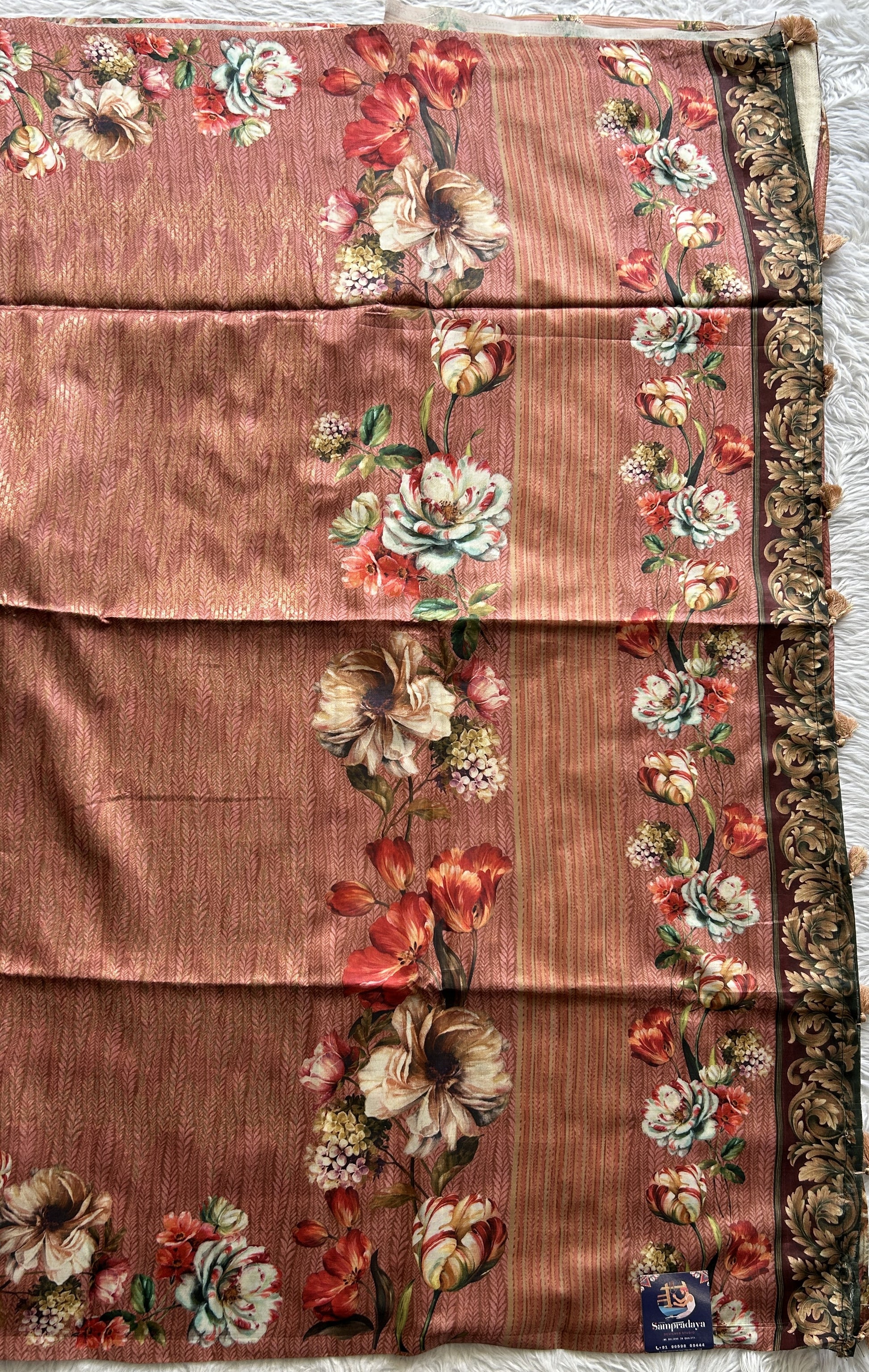 Banarasi Fancy Saree Rust Colored Complemented with a Floral Border. - Sampradaya Designer Studio