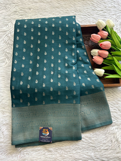 Semi Georgette Saree Peacock Blue Colored Complemented with a Zari Border. - Sampradaya Designer Studio