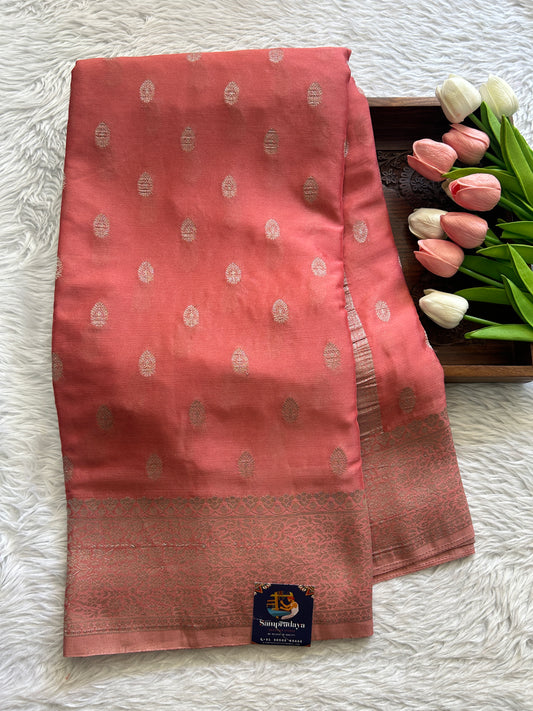 Semi Georgette Saree Peach Colored Complemented with a Zari Border. - Sampradaya Designer Studio