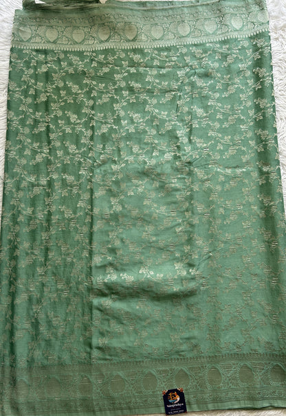 Semi Georgette Saree Sea Green Colored Complemented with a Zari Border. - Sampradaya Designer Studio