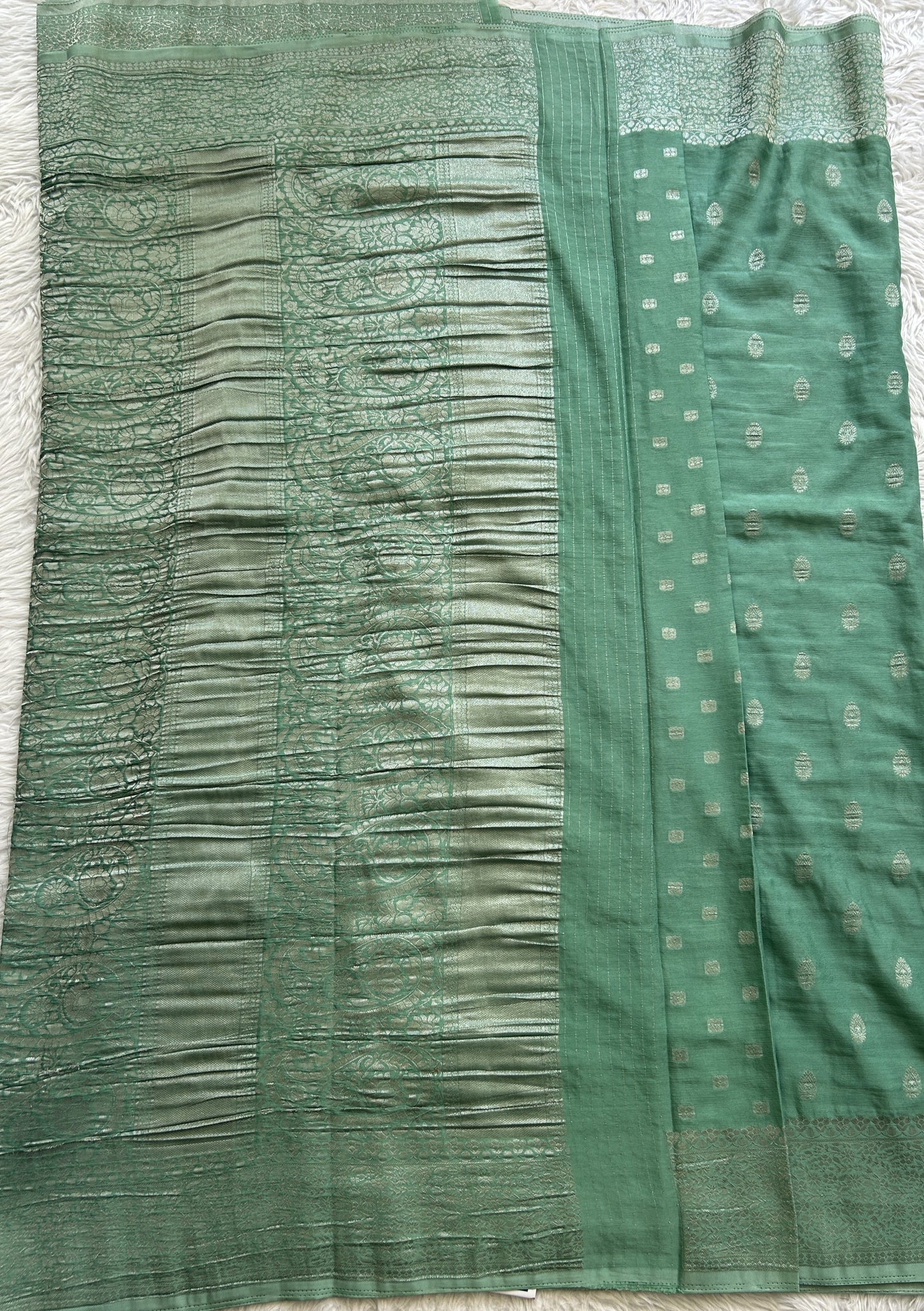 Semi Georgette Saree Aqua Green Colored Complemented with a Zari Border. - Sampradaya Designer Studio