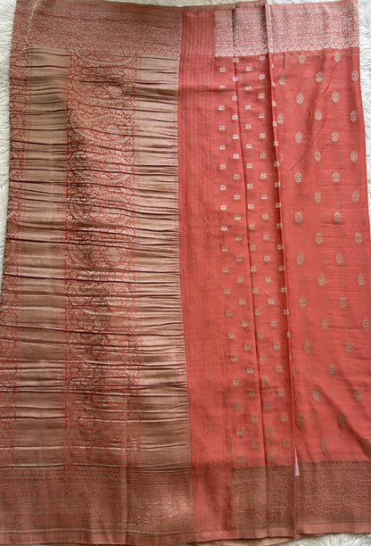 Semi Georgette Saree Peach Colored Complemented with a Zari Border. - Sampradaya Designer Studio