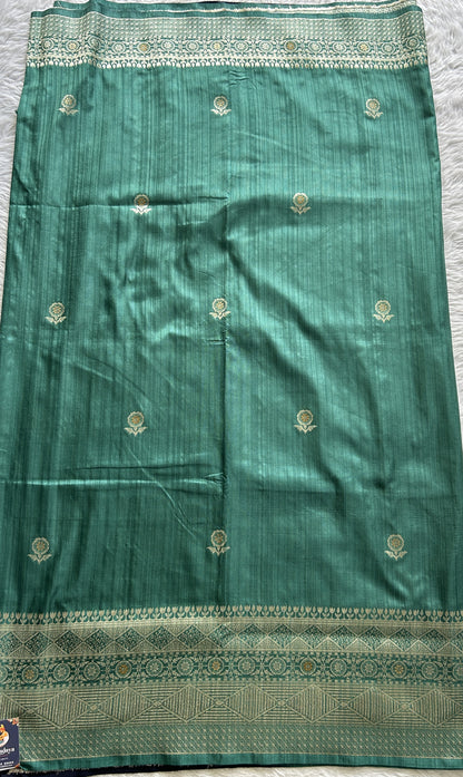 Semi Raw Silk Saree Rama Green Colored Complemented with a Zari Border. - Sampradaya Designer Studio