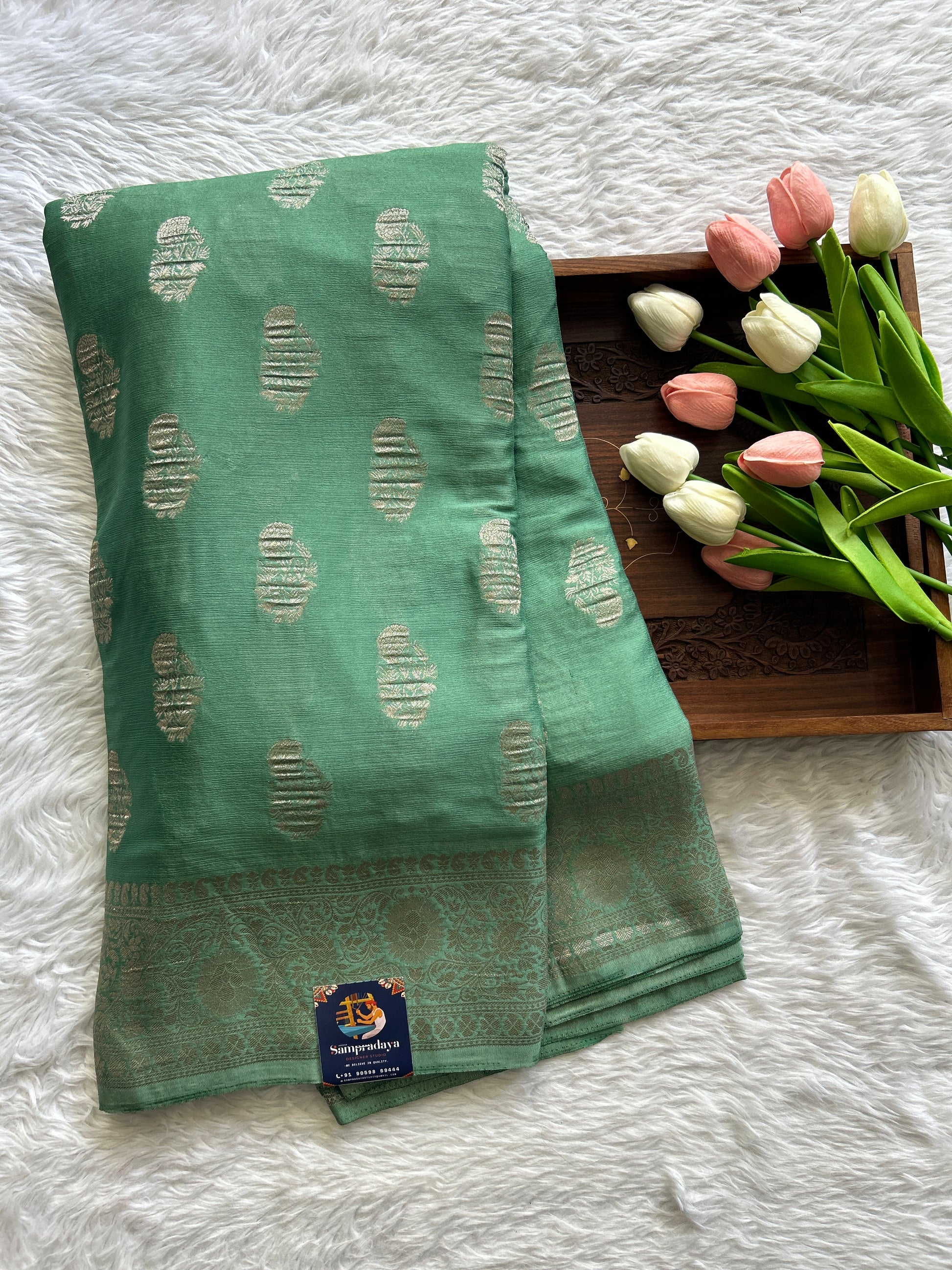 Semi Georgette Saree Sea Green Colored Complemented with a Zari Border. - Sampradaya Designer Studio