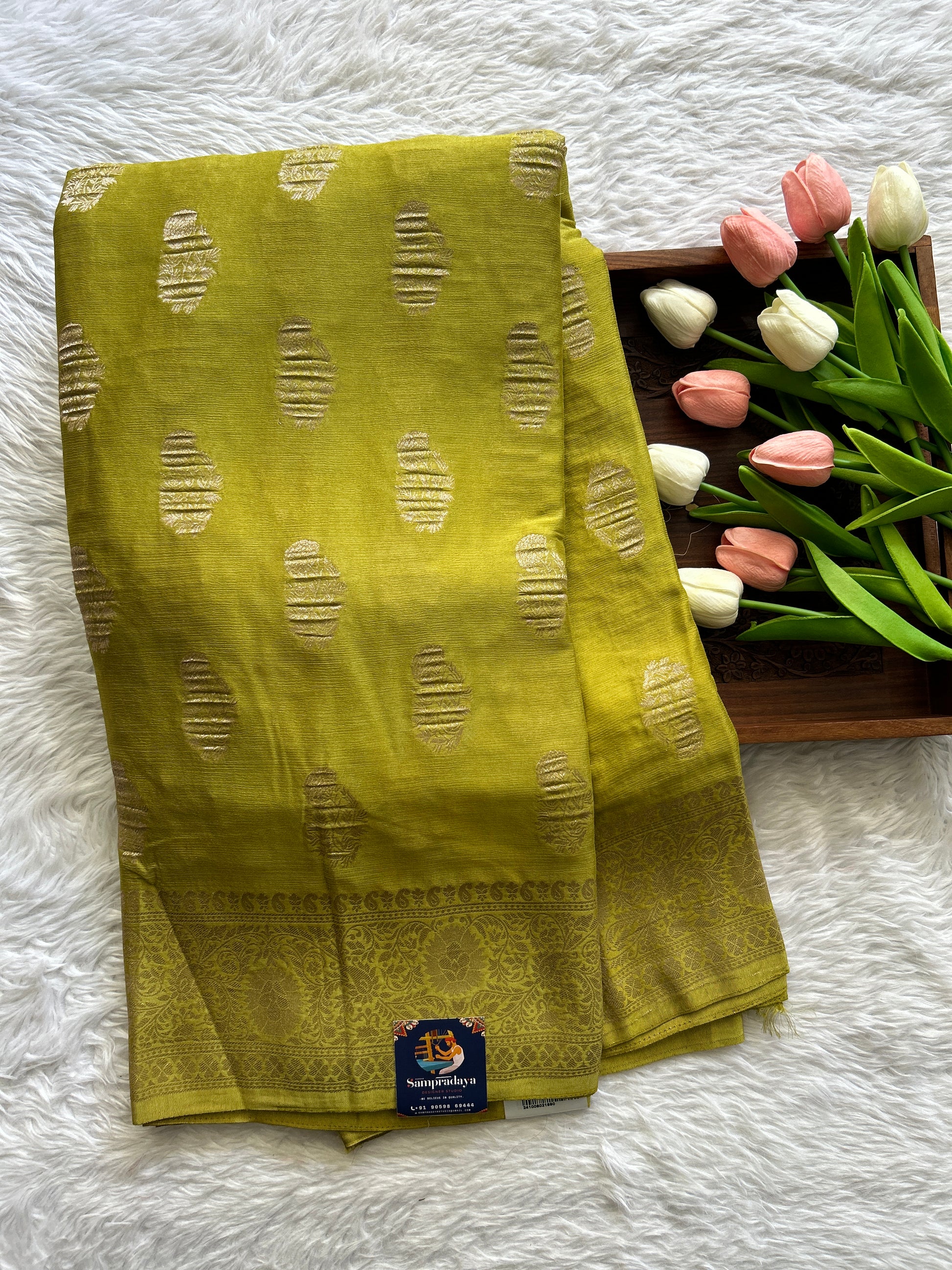 Semi Georgette Saree Dark Lime Green Colored Complemented with a Zari Border. - Sampradaya Designer Studio