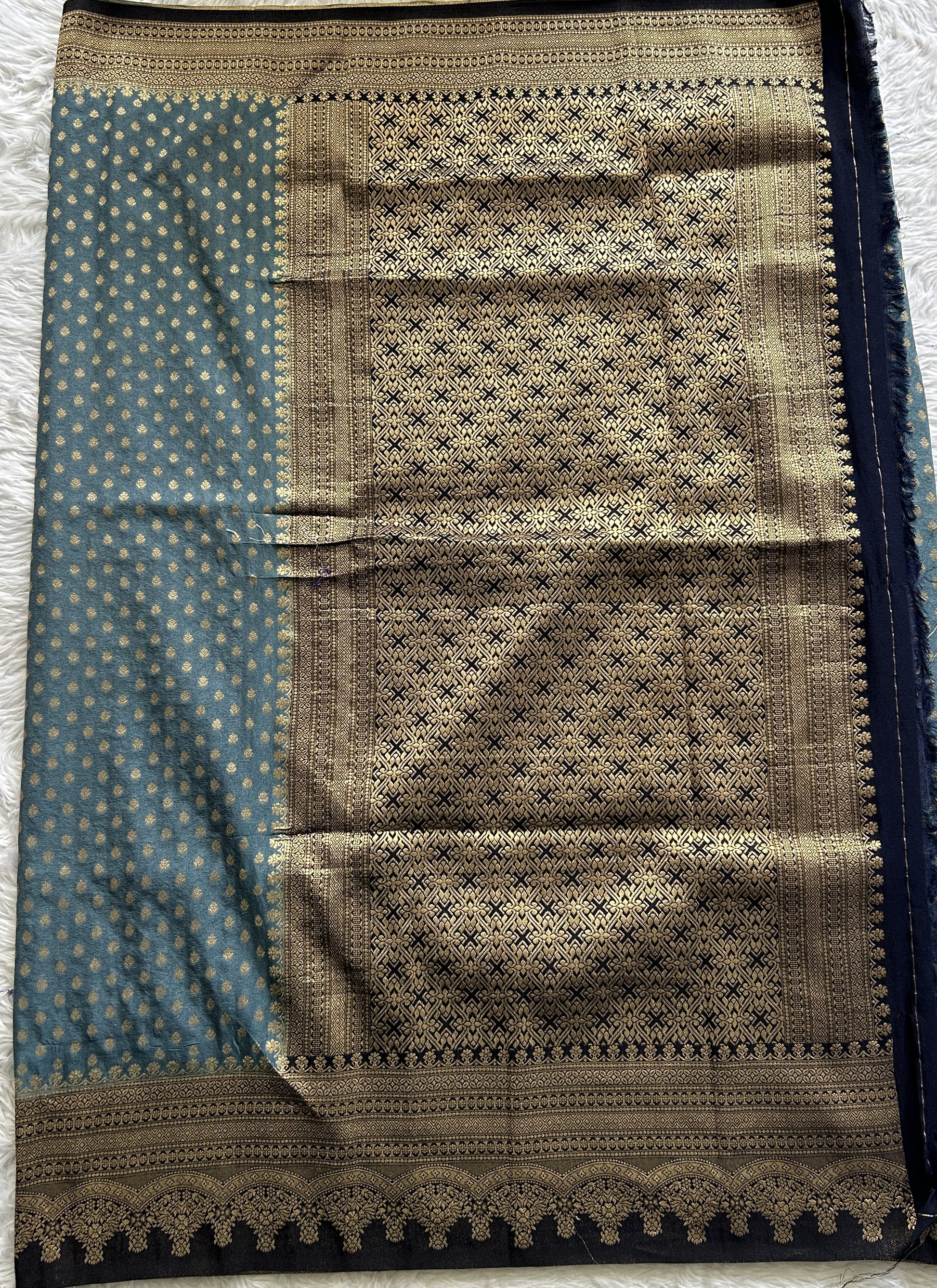 Semi Georgette Saree Sea Blue Colored Complemented with a Zari Border. - Sampradaya Designer Studio