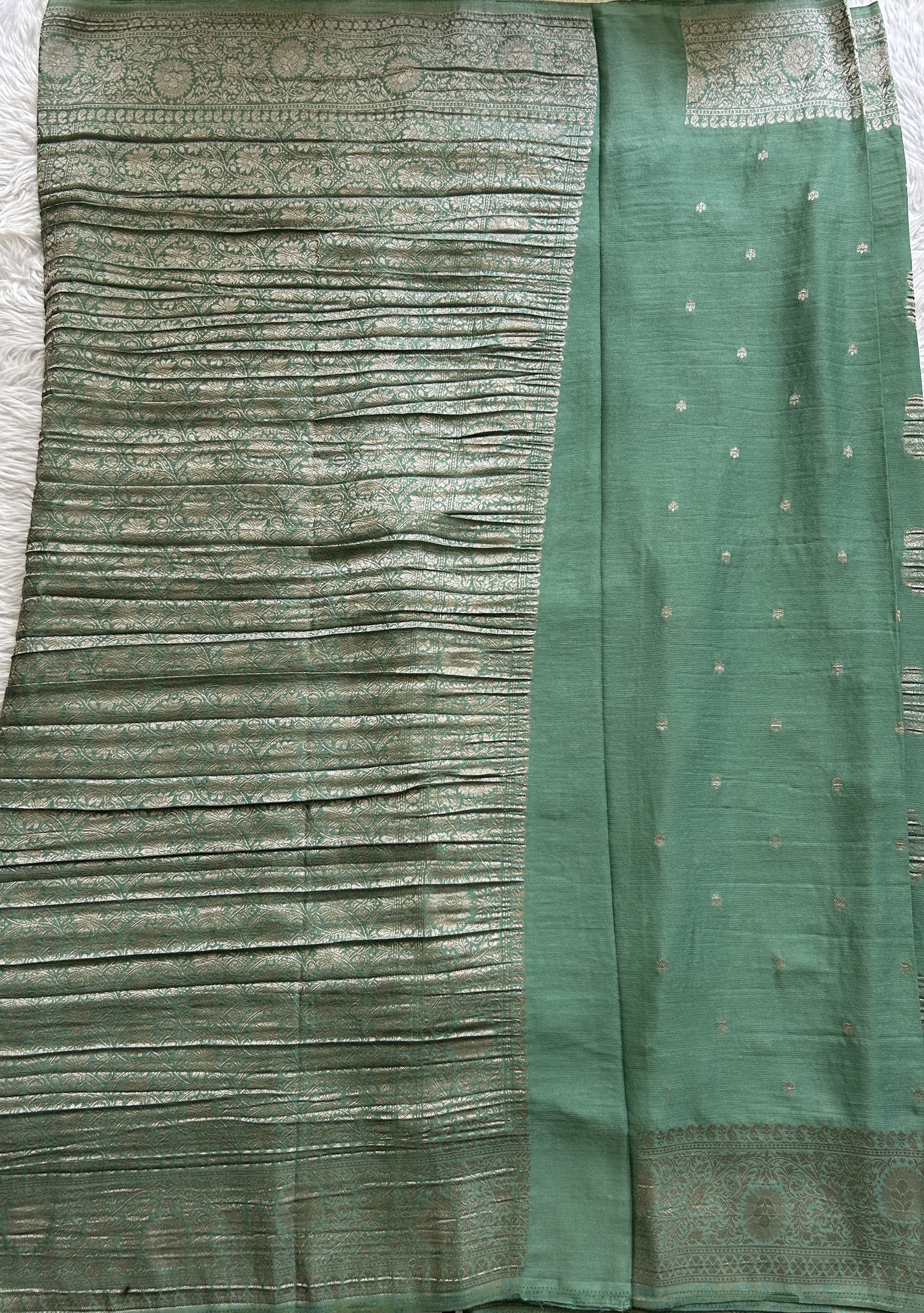 Semi Georgette Saree Sea Green Colored Complemented with a Zari Border. - Sampradaya Designer Studio