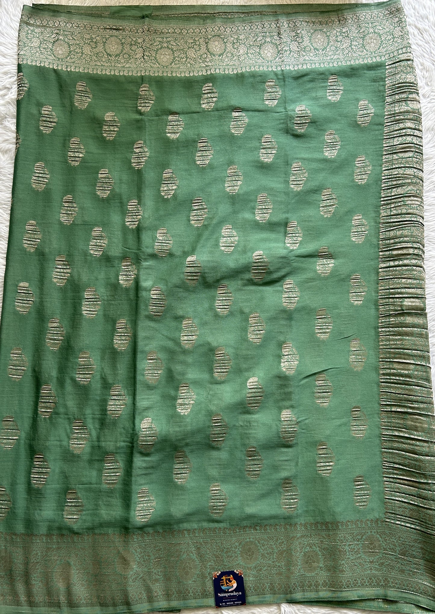 Semi Georgette Saree Sea Green Colored Complemented with a Zari Border. - Sampradaya Designer Studio