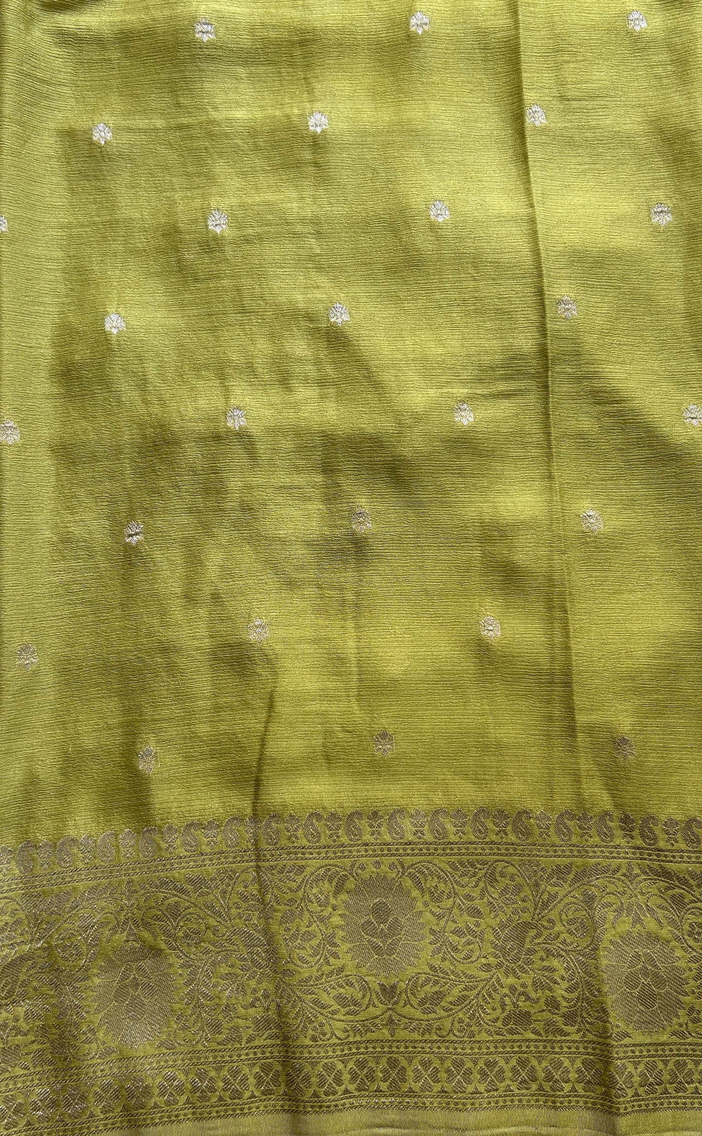 Semi Georgette Saree Dark Lime Green Colored Complemented with a Zari Border. - Sampradaya Designer Studio