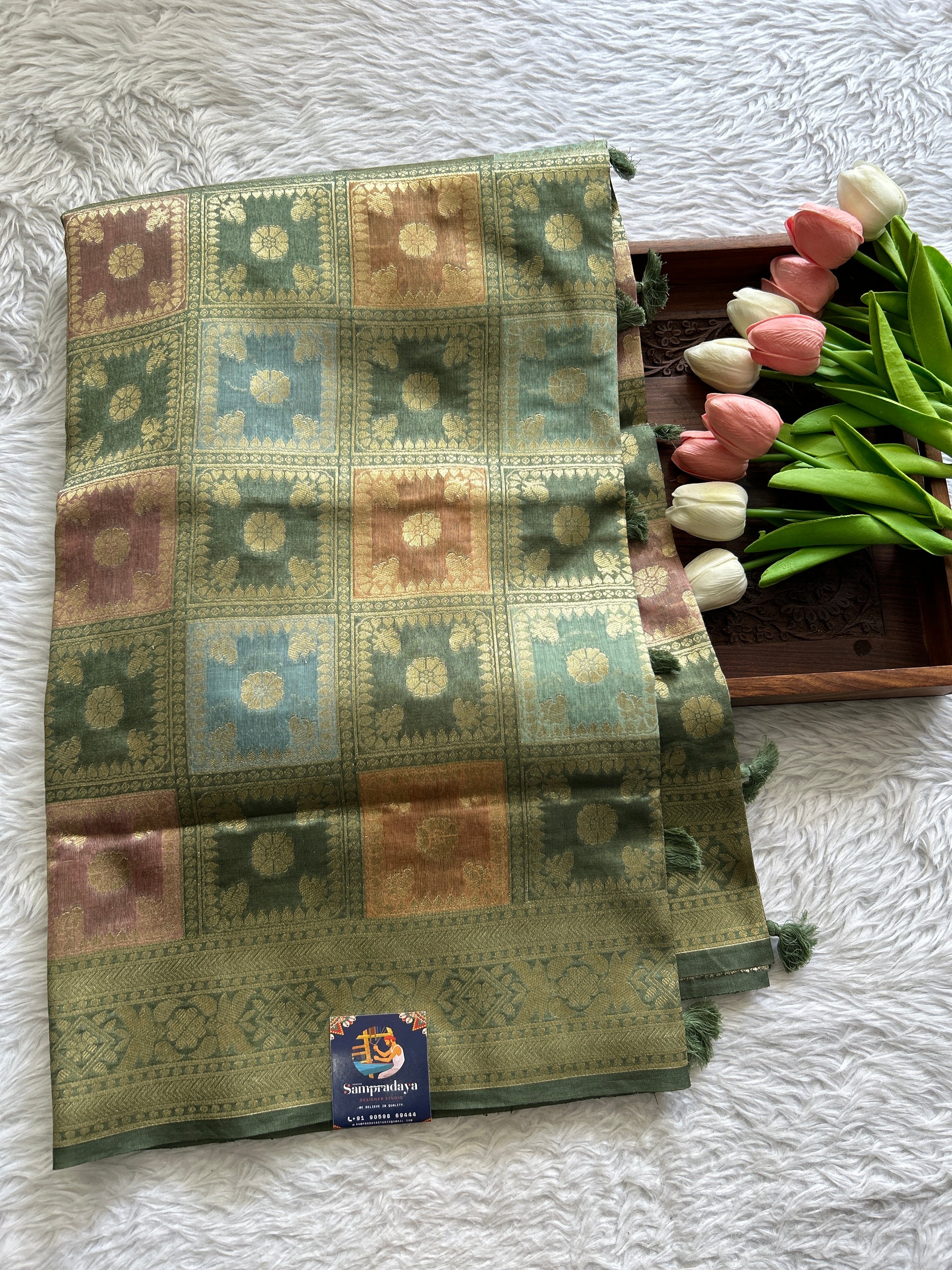 Semi Raw Silk Saree Light Olive Green Colored Complemented with a Zari Border. - Sampradaya Designer Studio