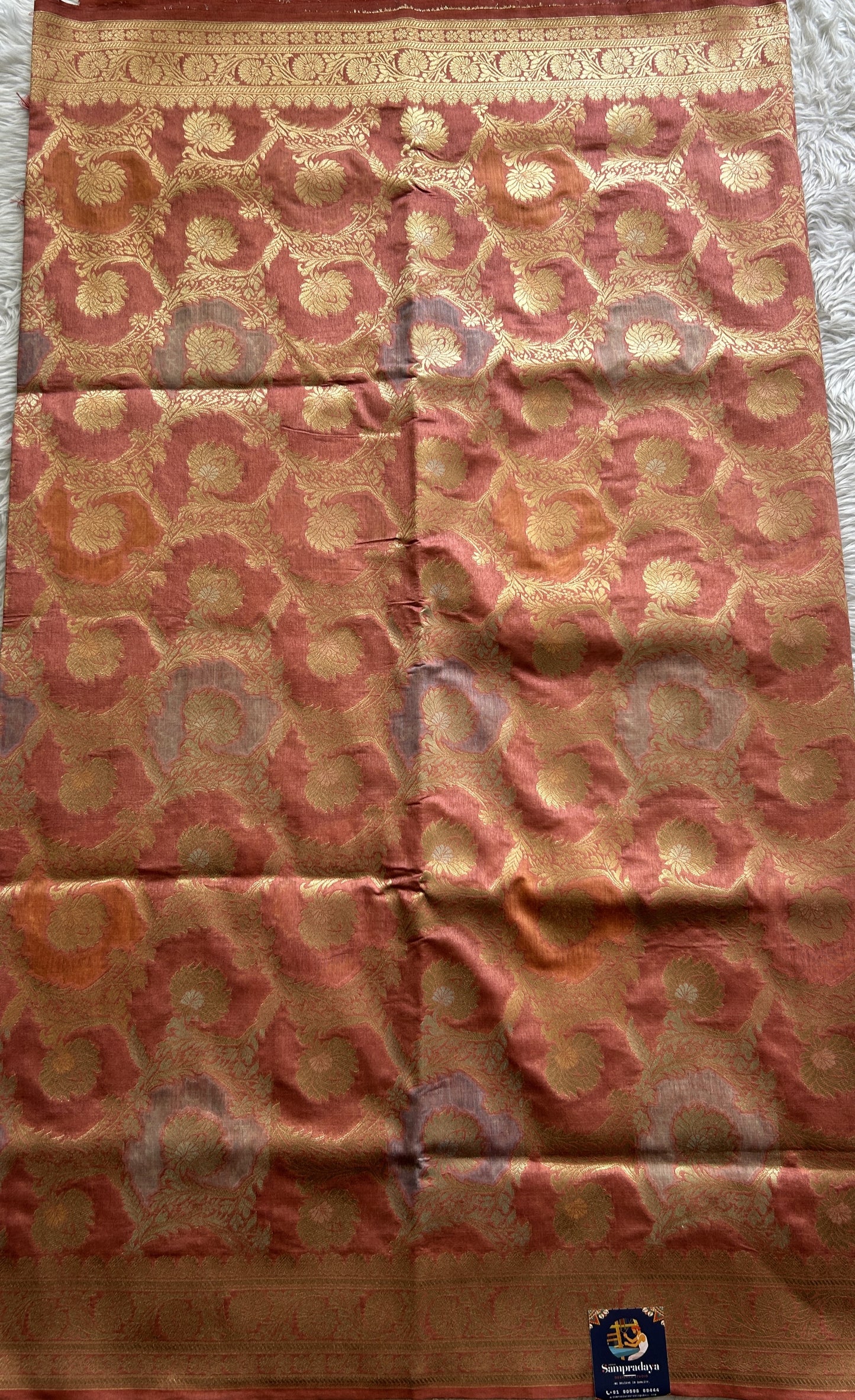 Semi Raw Silk Saree Peach Colored Complemented with a Zari Border. - Sampradaya Designer Studio