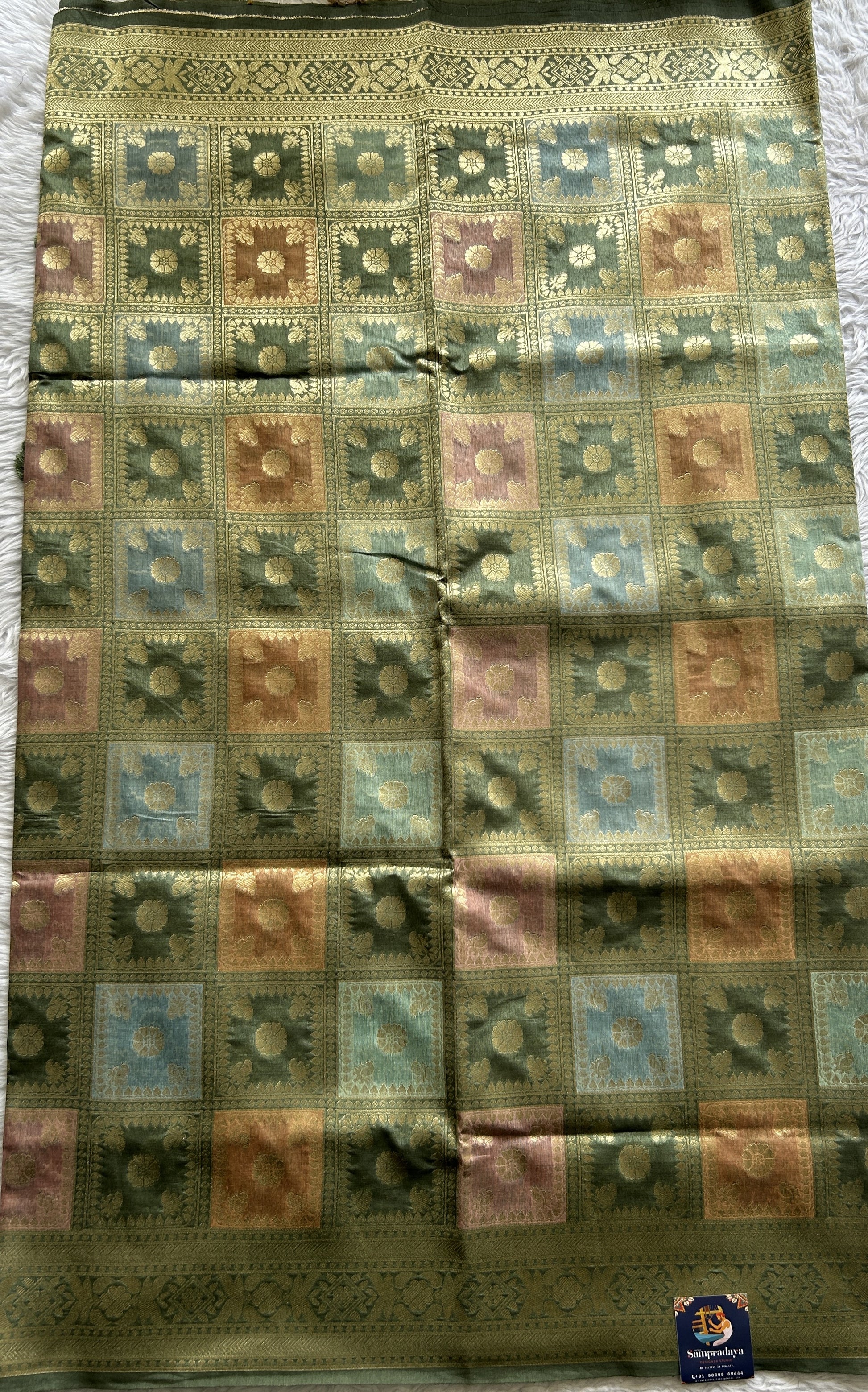 Semi Raw Silk Saree Light Olive Green Colored Complemented with a Zari Border. - Sampradaya Designer Studio