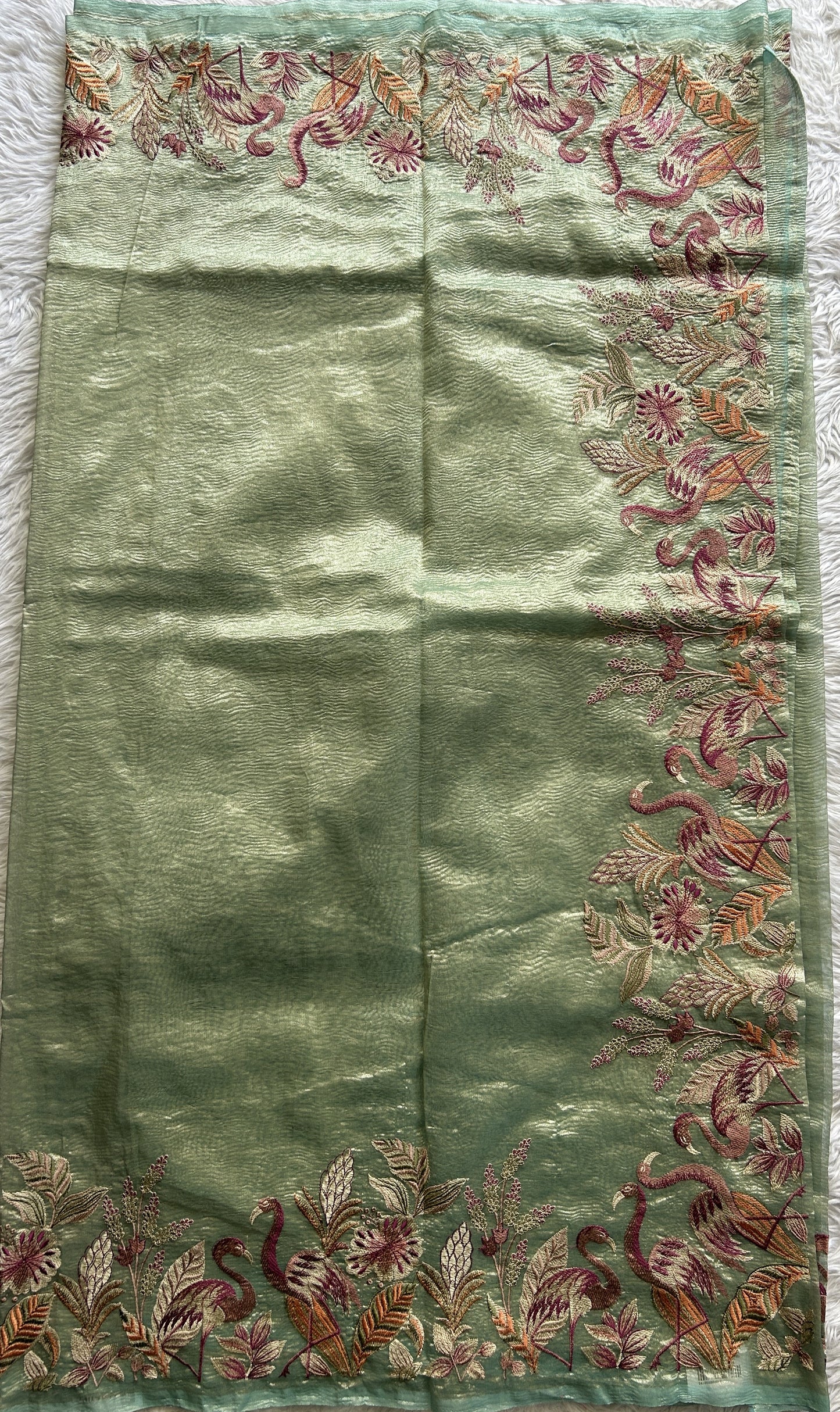 Banarasi Fancy Crushed Saree Light Green Colored Complemented with a Machine Embroidery Border. - Sampradaya Designer Studio