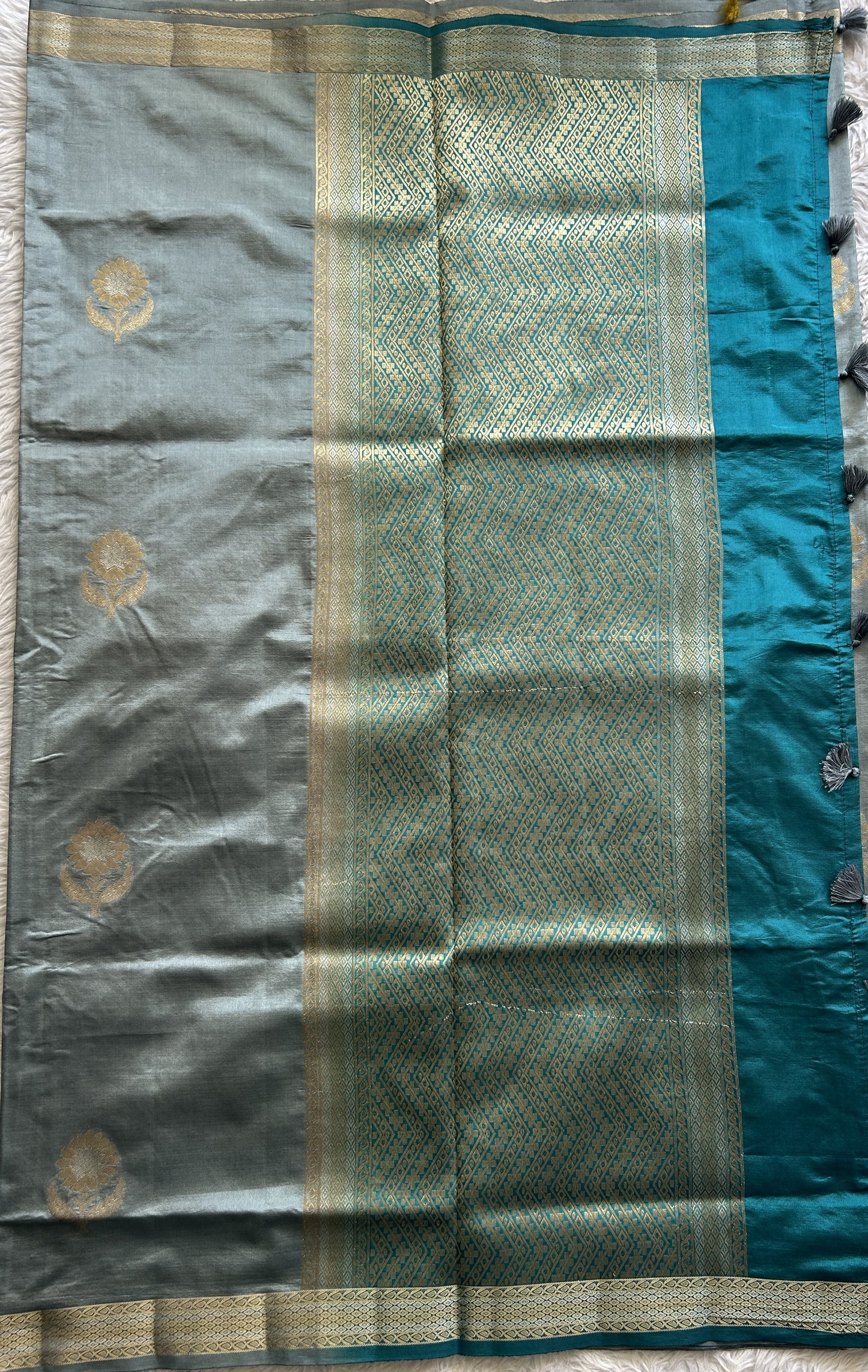 Semi Raw Silk Saree Light Blue Colored Complemented with a Zari Border. - Sampradaya Designer Studio