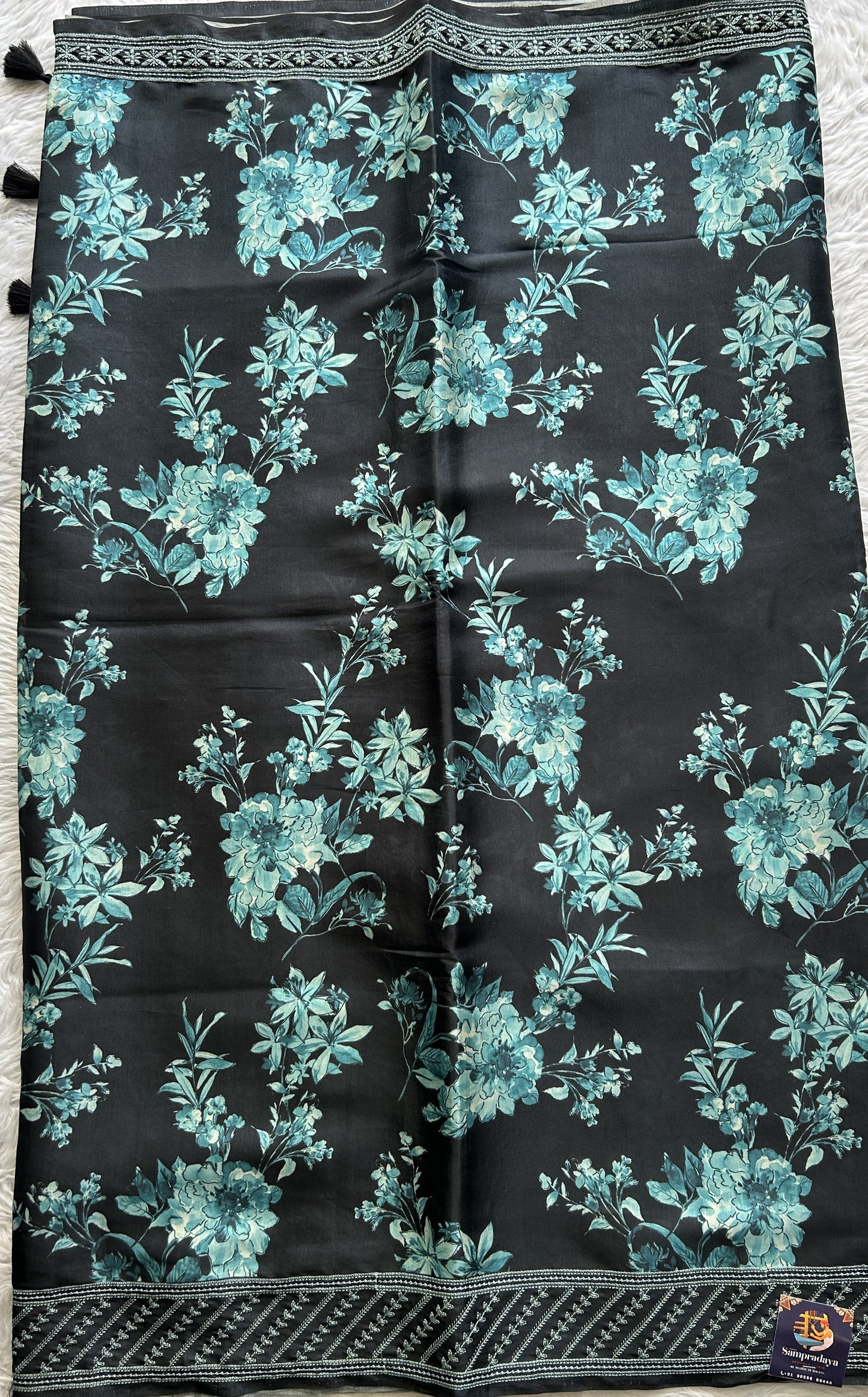 Semi Tussar Saree Black Colored complemented with a Blue Thread Embroidery Border. - Sampradaya Designer Studio