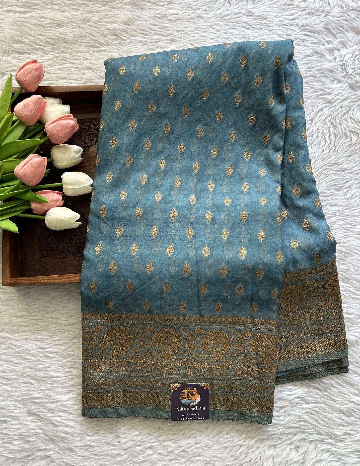 Semi Georgette Saree Aqua Blue Colored Complemented with a Zari Border. - Sampradaya Designer Studio