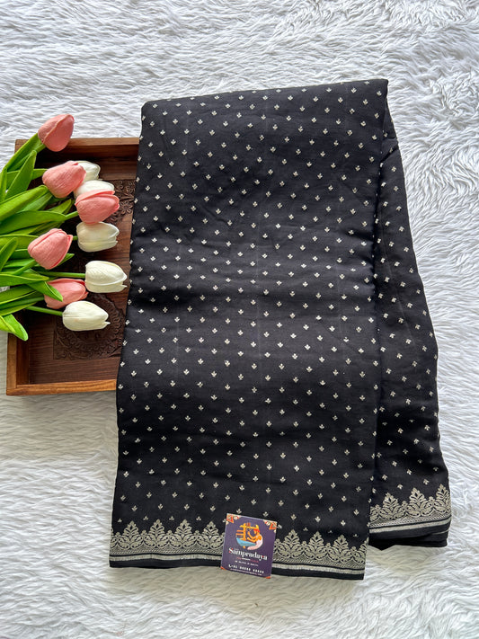 Banarasi Georgette Saree Black colored complemented with a Silver Zari border. - Sampradaya Designer Studio