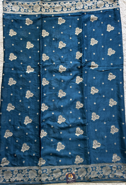 Viscose Georgette Saree Peacock Blue Colored Complemented with a Zari Border. - Sampradaya Designer Studio