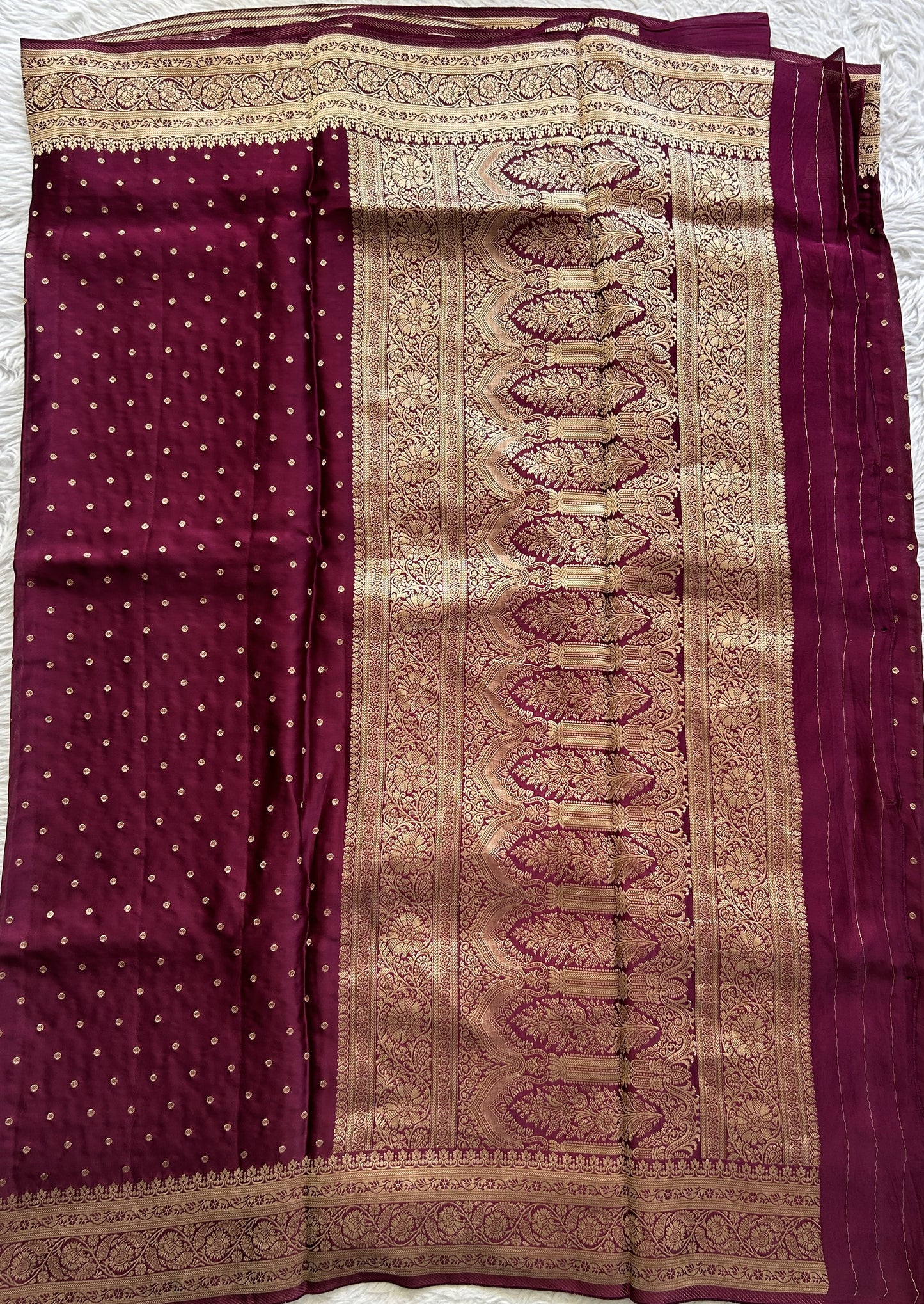 Satin Georgette Saree Magenta Colored Complemented with a Zari Border. - Sampradaya Designer Studio